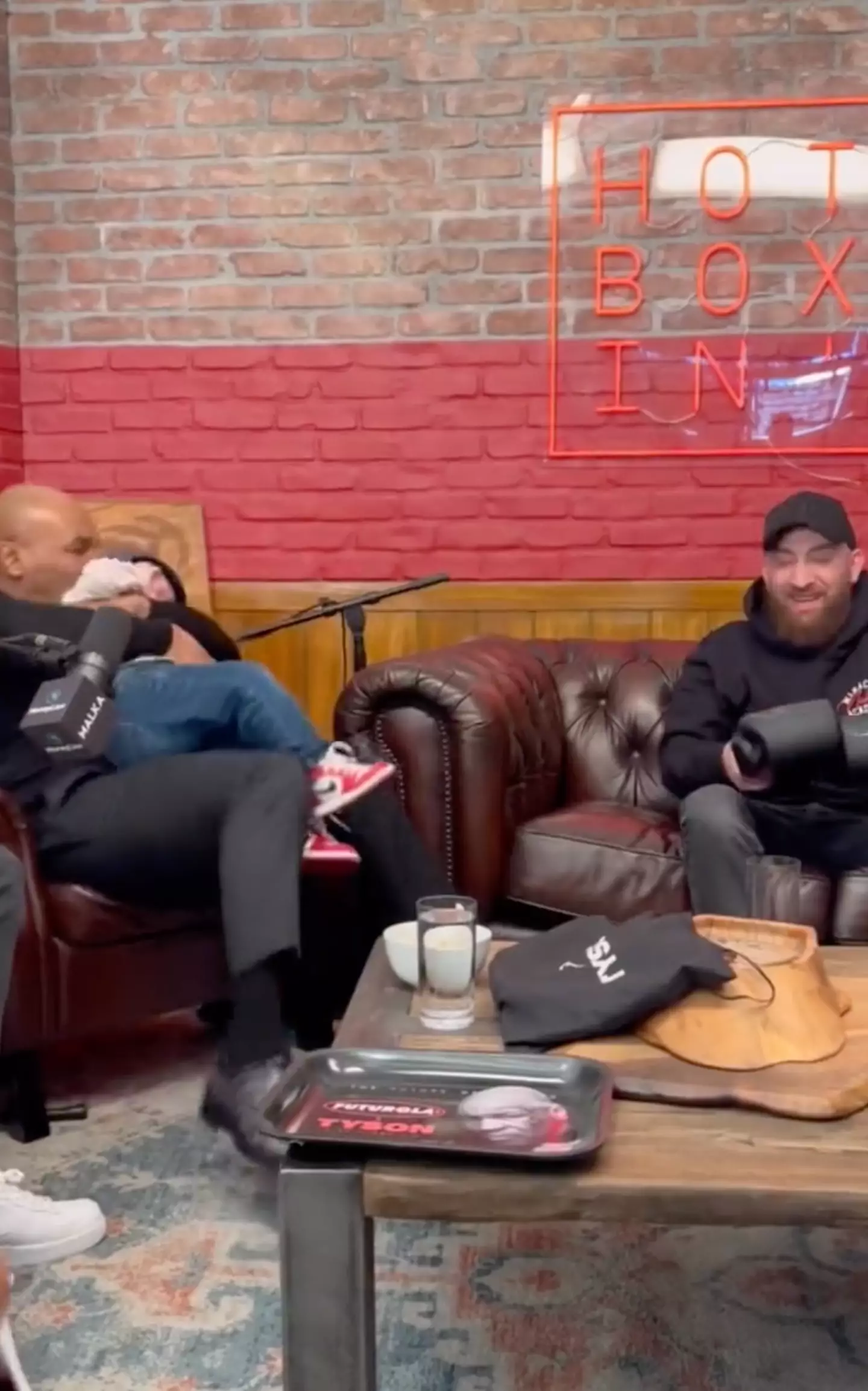 Tyson then pretend to nibble Hasbula's ear.