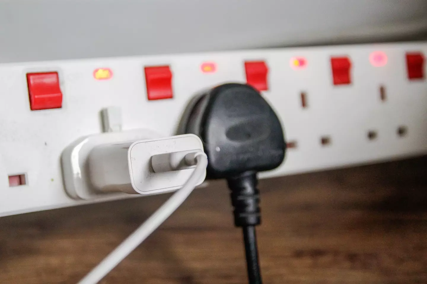 Instead of packing multiple adapters, she simply brings an extension lead and single adapter to charge her electronics. (Getty Stock Photo)