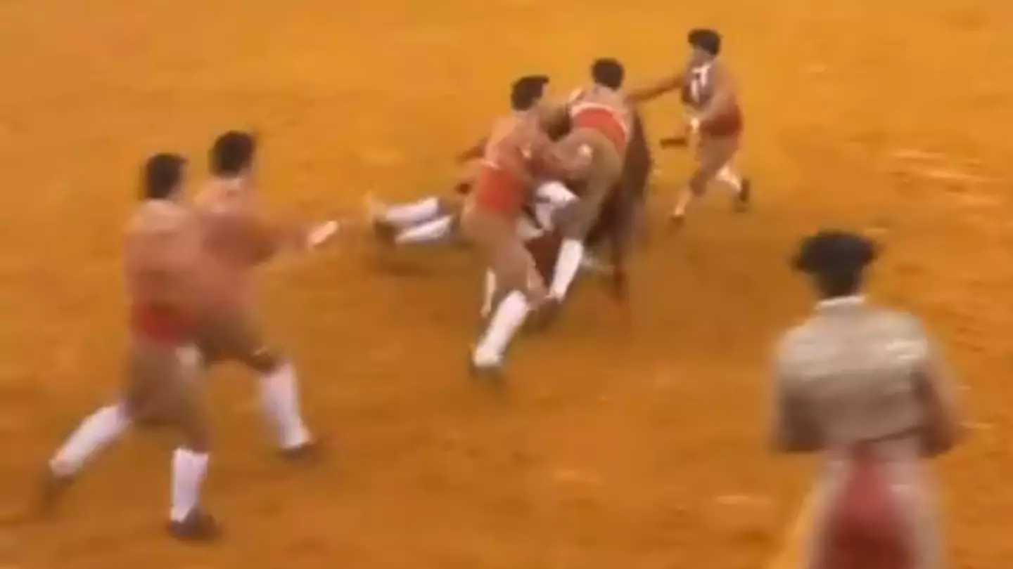 Horrifying moment bullfighter dies after being picked up and slammed against wall by bull in front of crowd