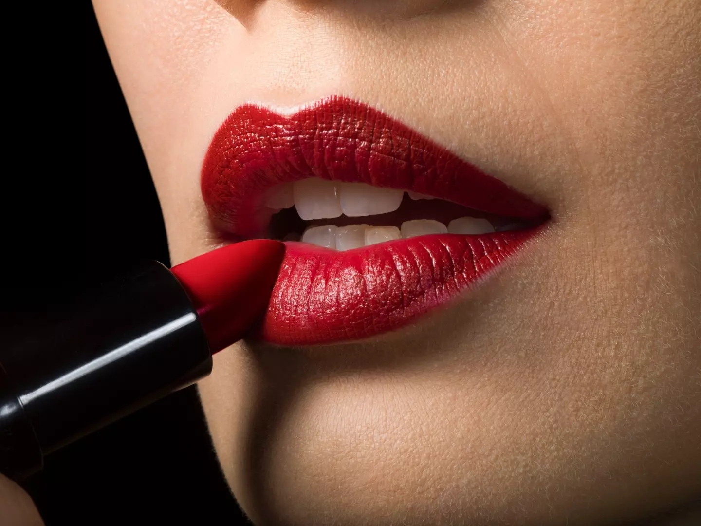 Red lips are standard on some airlines. (Getty Stock)