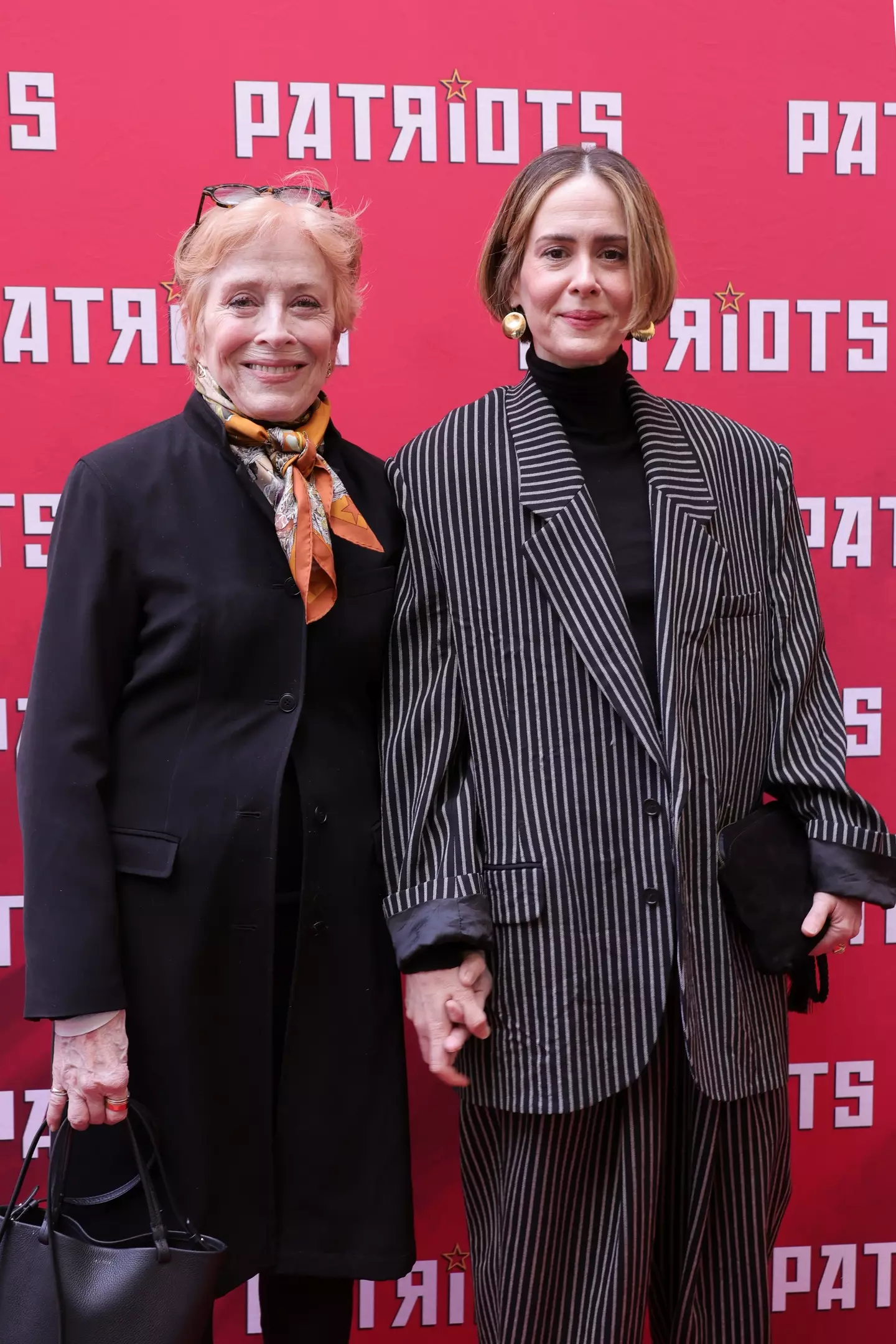 They don't live together, but Paulson said she couldn't do separate bedrooms for a sweet reason. (Michael Loccisano/Getty Images)