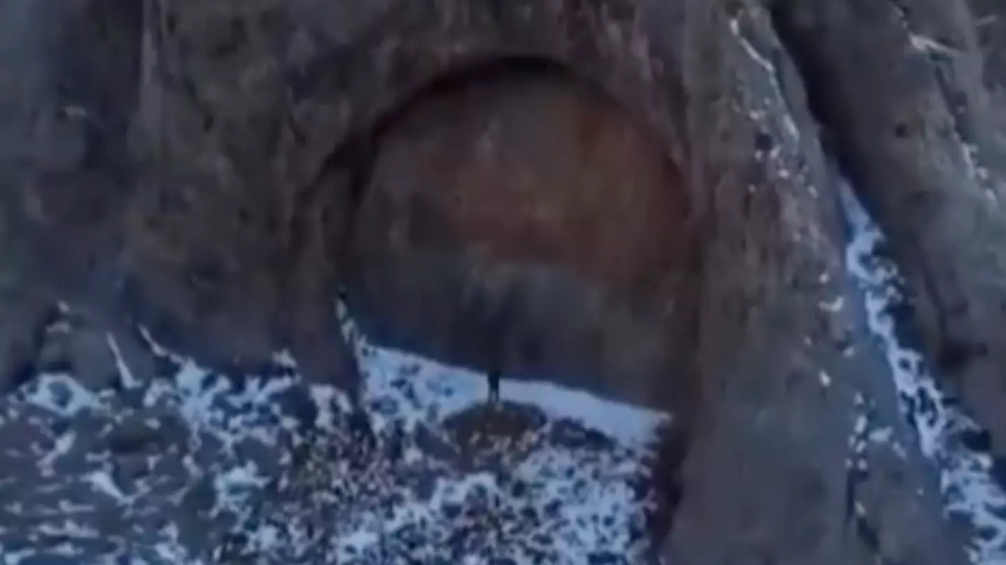 Truth behind huge 'doorway' as explorers discover ginormous structure in remote mountains