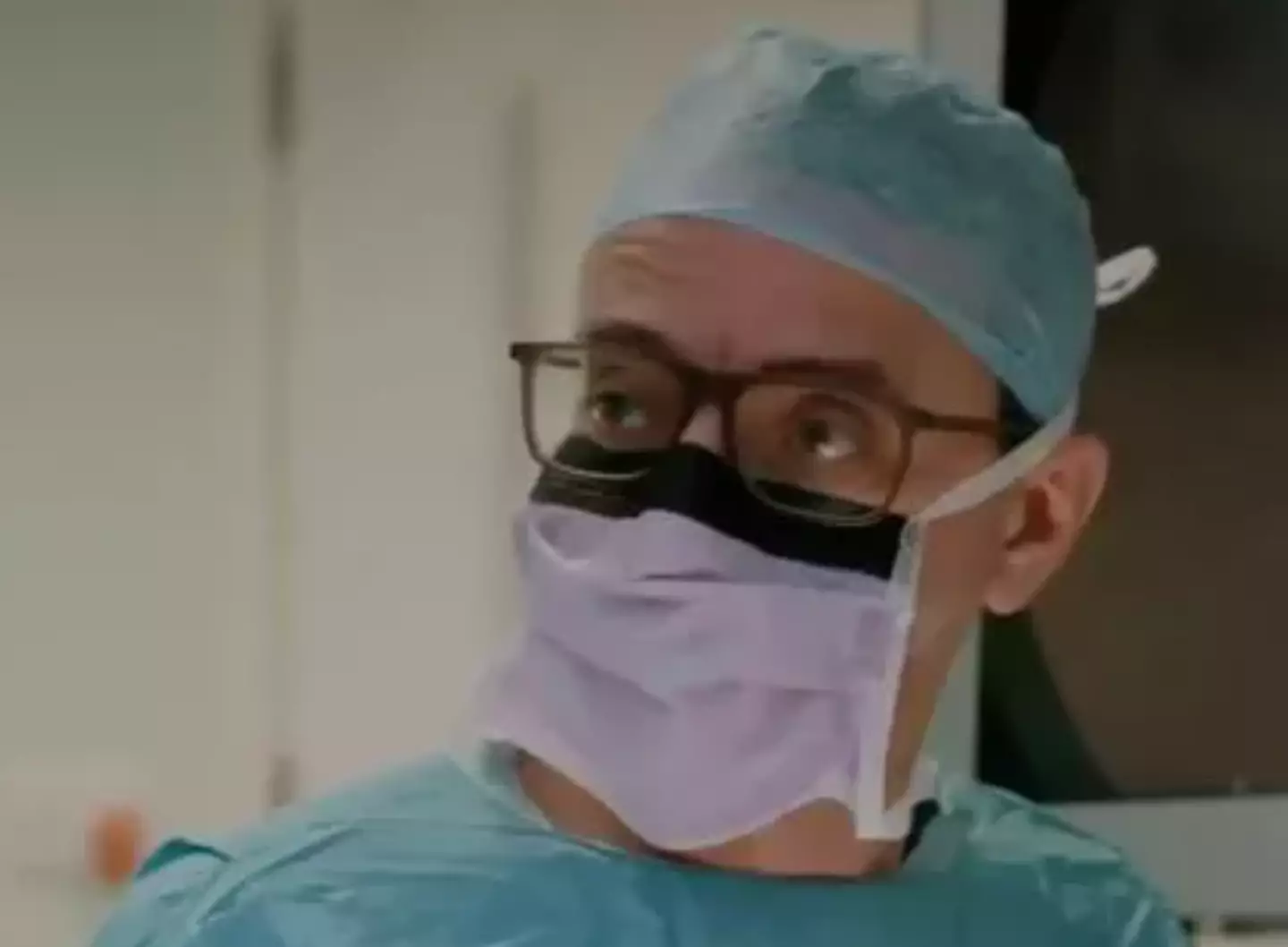 Surgeon Hazim Fallouh conducts Ken's surgery.