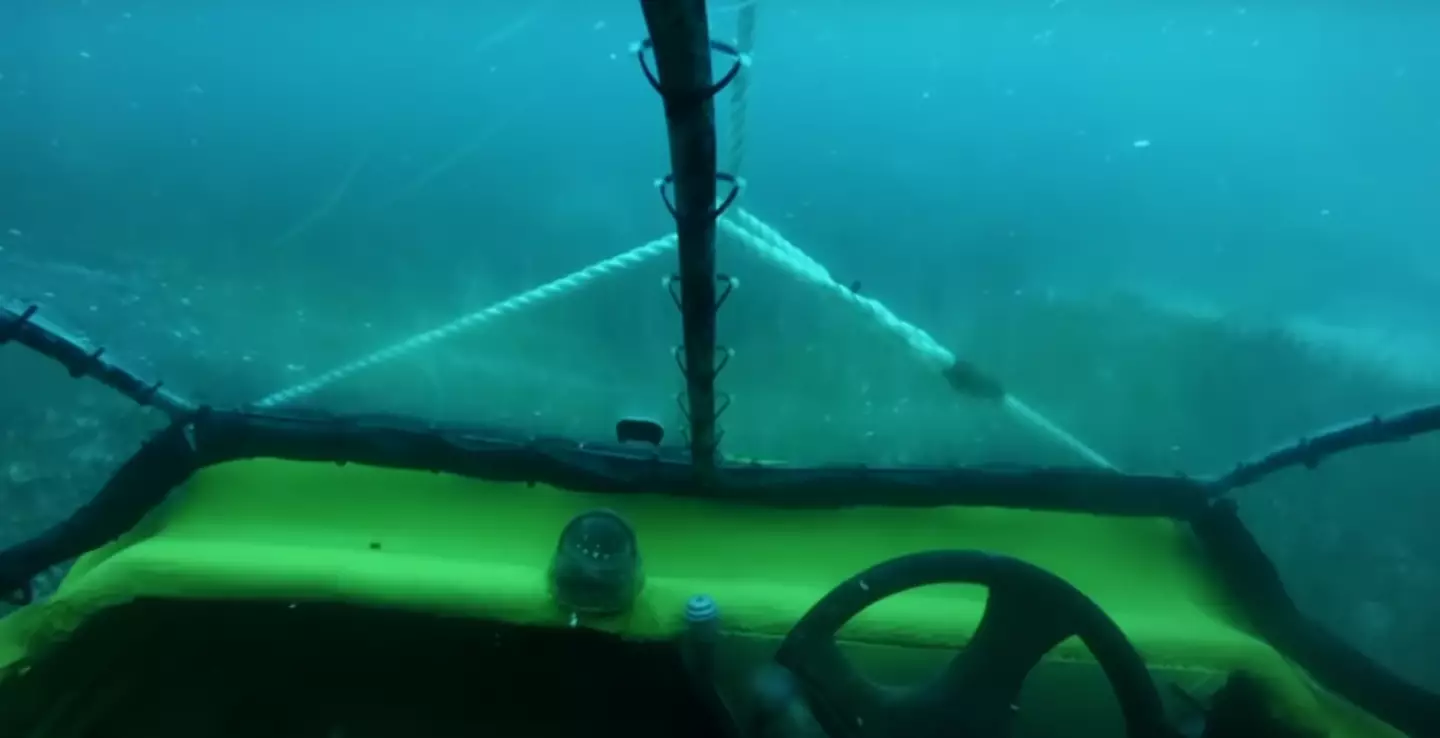 The camera films itself hitting the ocean seabed after it's severed from the divers' boat.