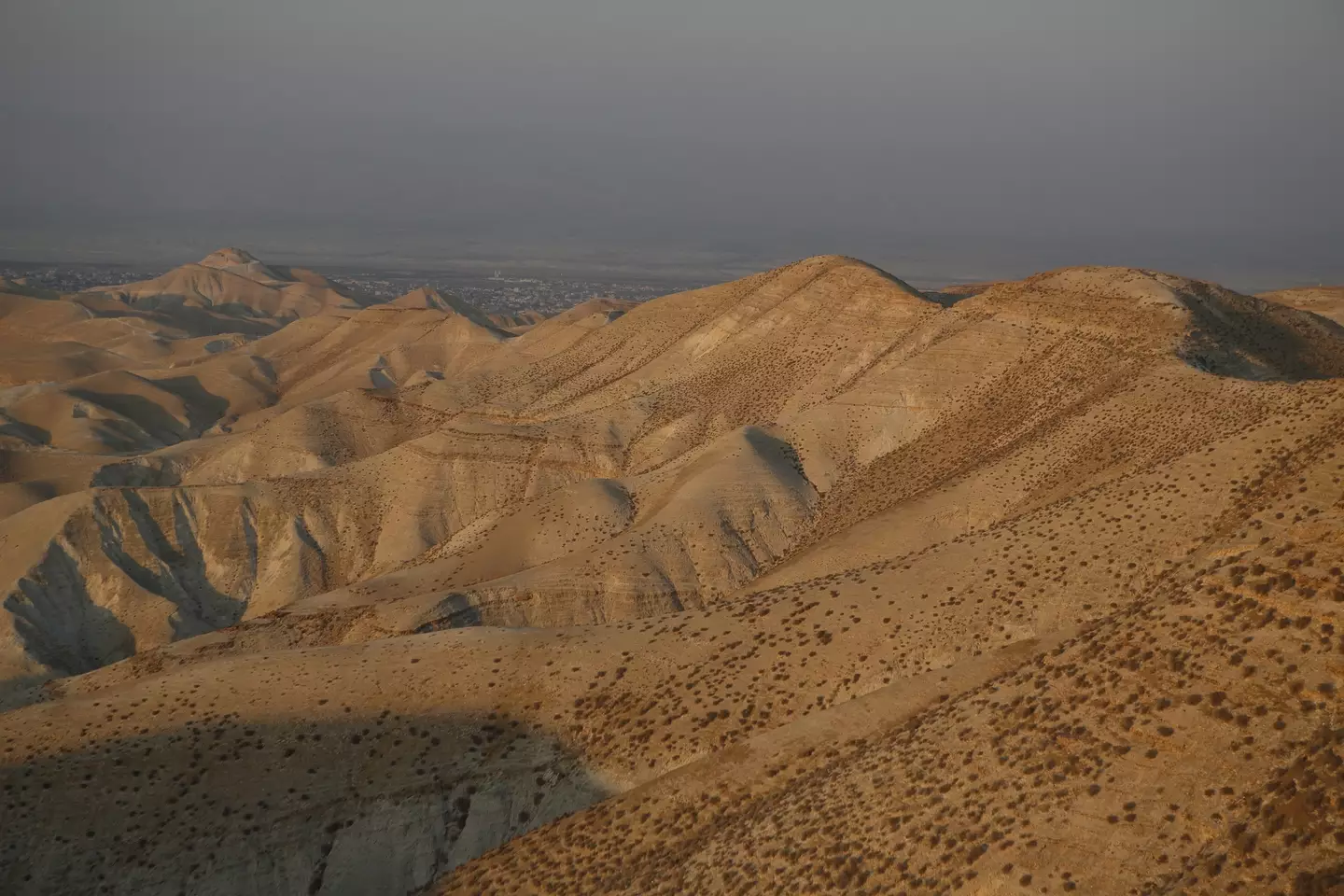 The terrain of the Judean Desert is not kind to people, with hundreds of caves lining its cliffs (Getty Stock Images)