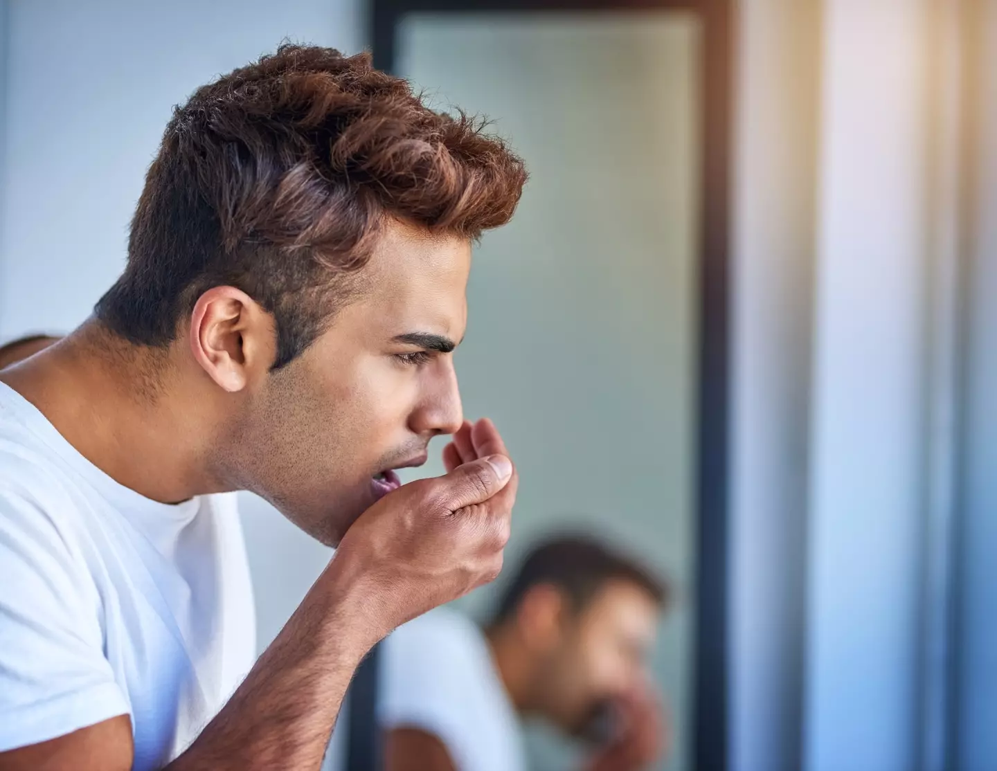 "Jesus Christ, I stink like something crawled into my mouth and died." (Getty Stock Photo)