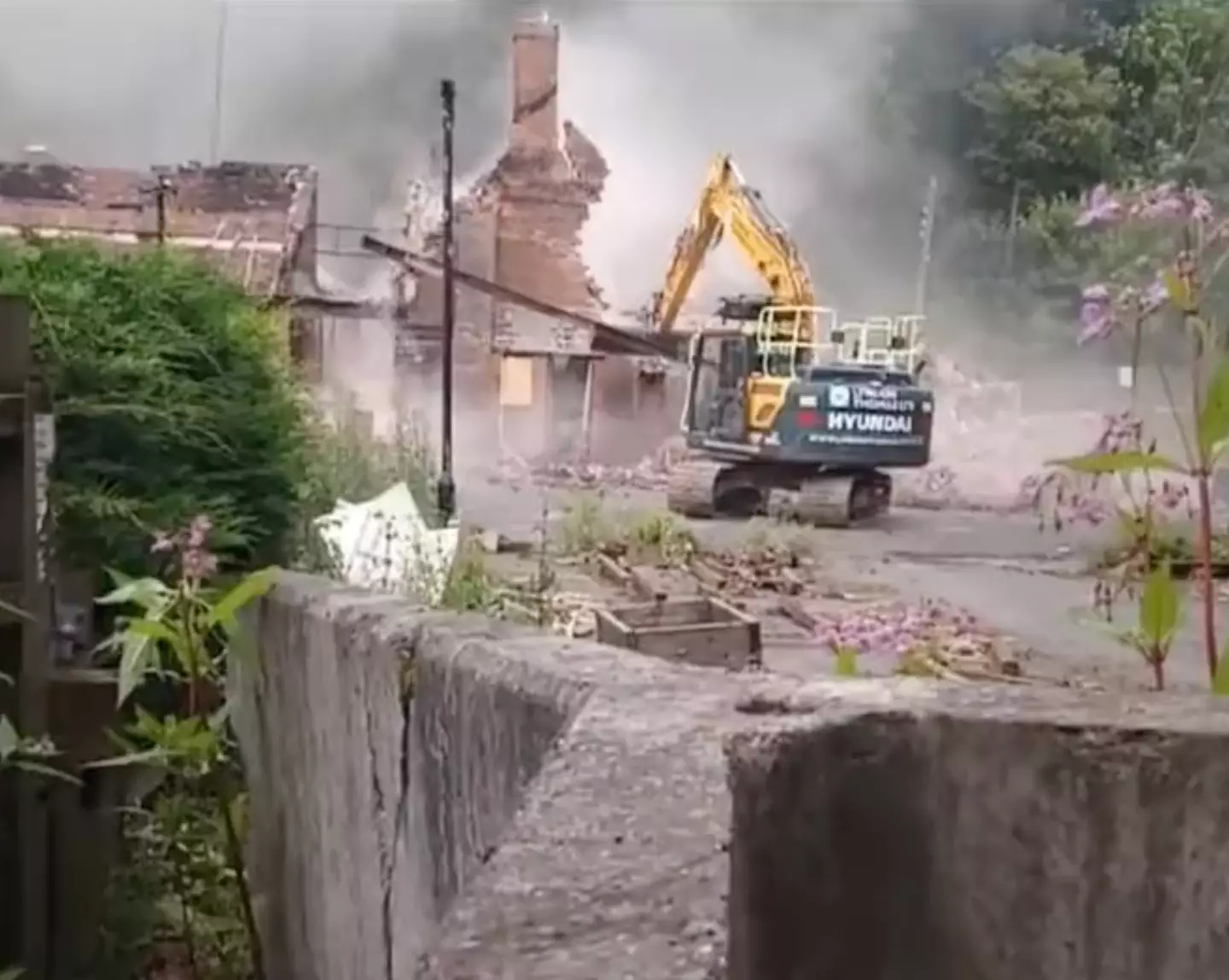 Demolition crews arrived at the pub after the fire.