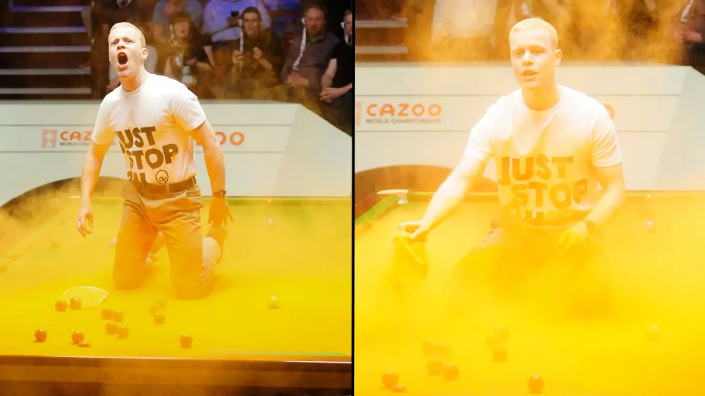 World Snooker Championship halted as protester climbs on table and covers it in orange powder