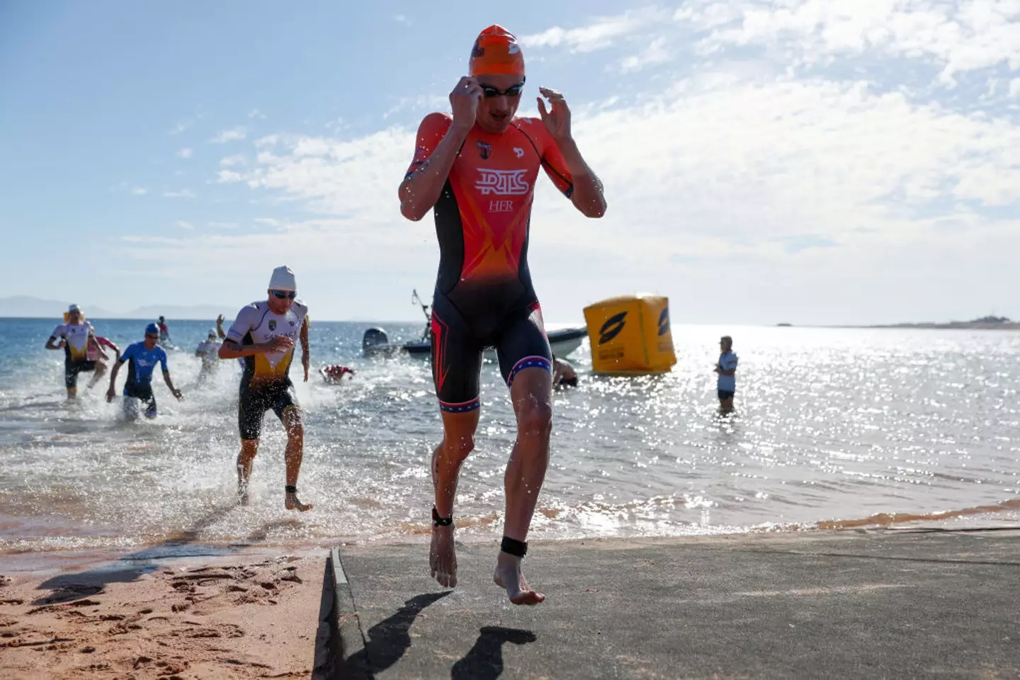We can't imagine anyone is rushing to shake Seth Rider's hand anytime soon. ( Joern Pollex/Getty Images for NEOM Beach Games 2023)