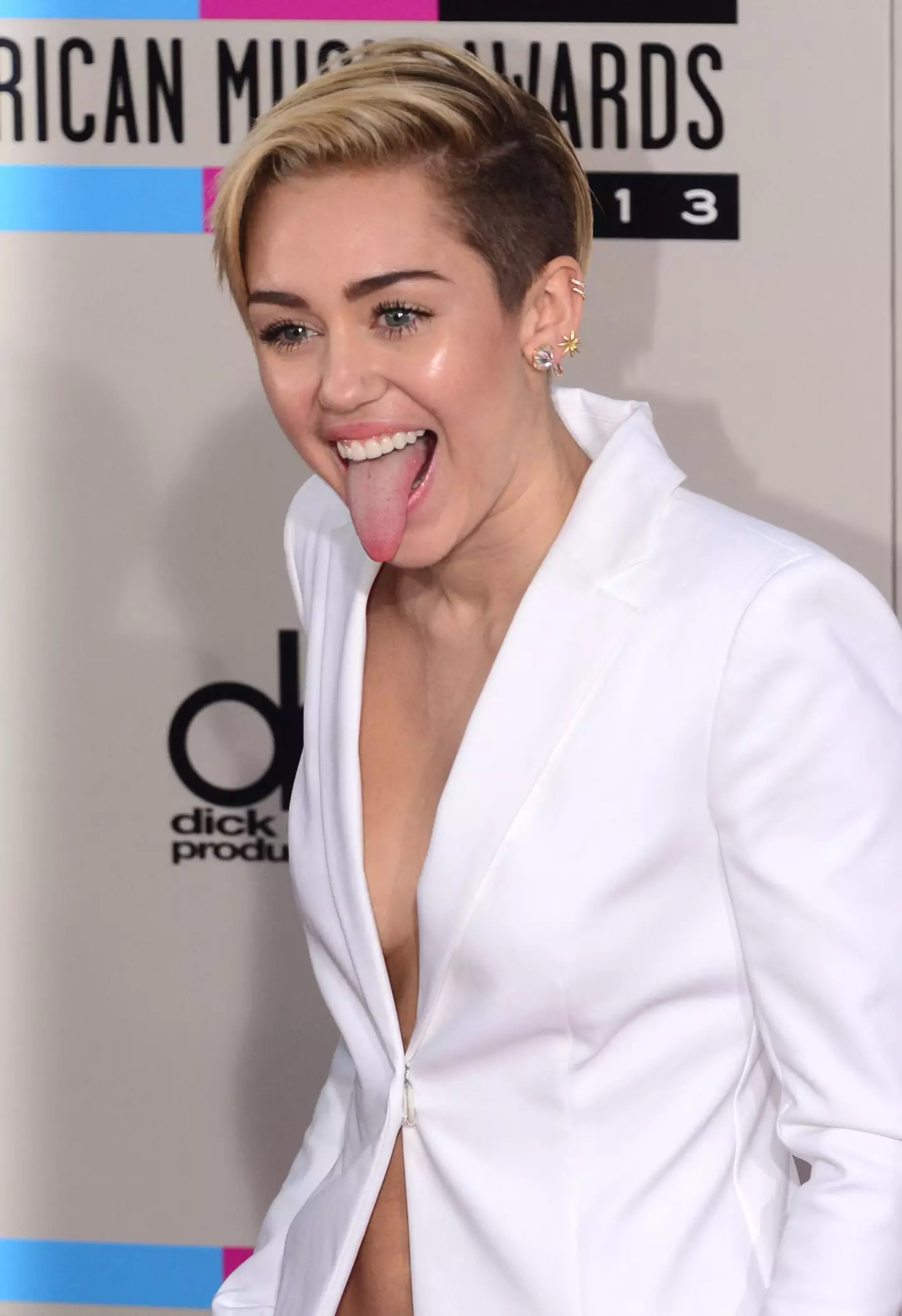 Miley Cyrus likes sticking her tongue out.