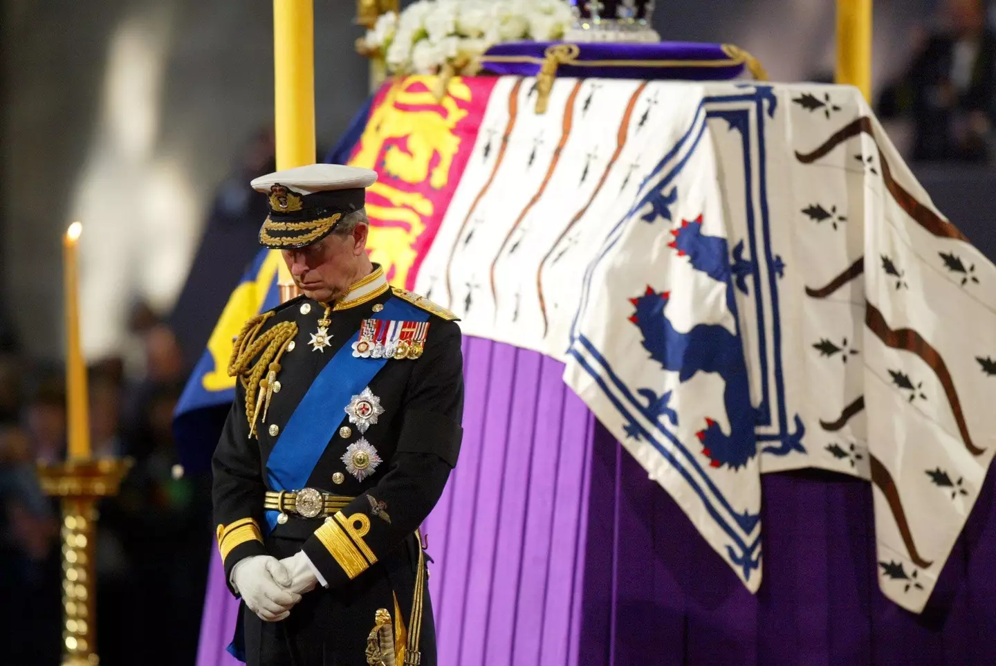 Then-Prince Charles standing beside the Queen Mother's coffin at Westminster Hall in 2002.