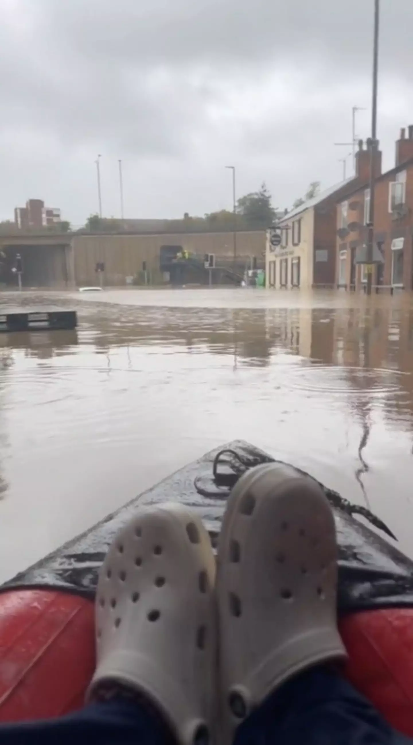 Storm Babet continues to rip through parts of the UK as a woman is forced to kayak home after finishing a 12 hour shift.