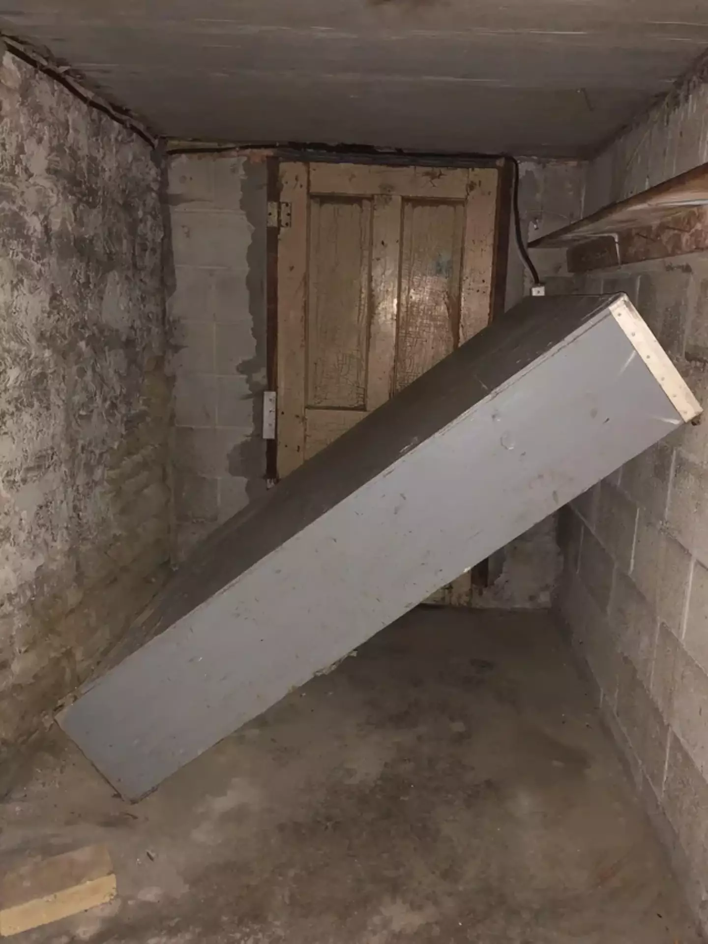 A man found a mysterious door in the basement of his new home.