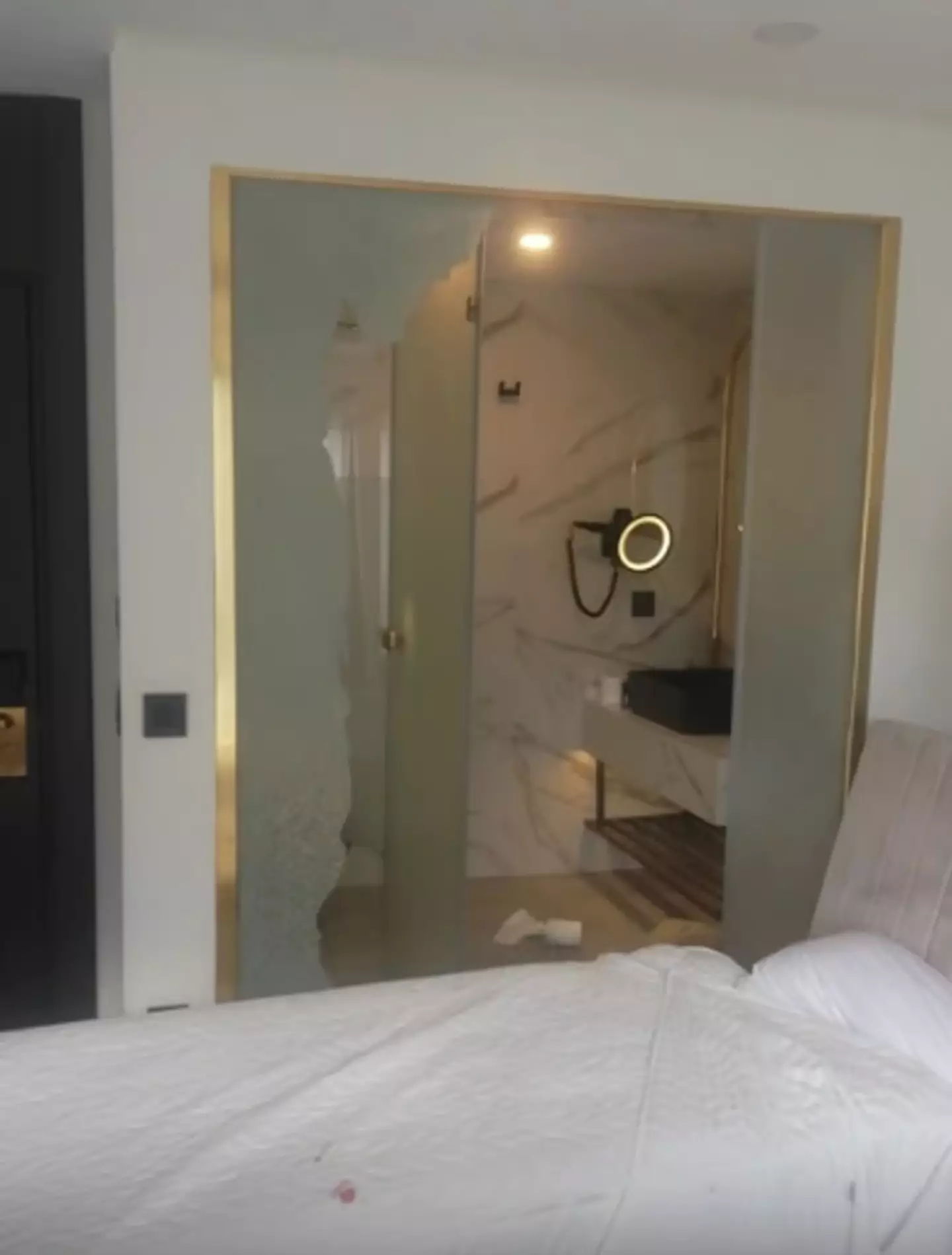 Images revealed the shower door had been completely smashed (Lexia Hotel)