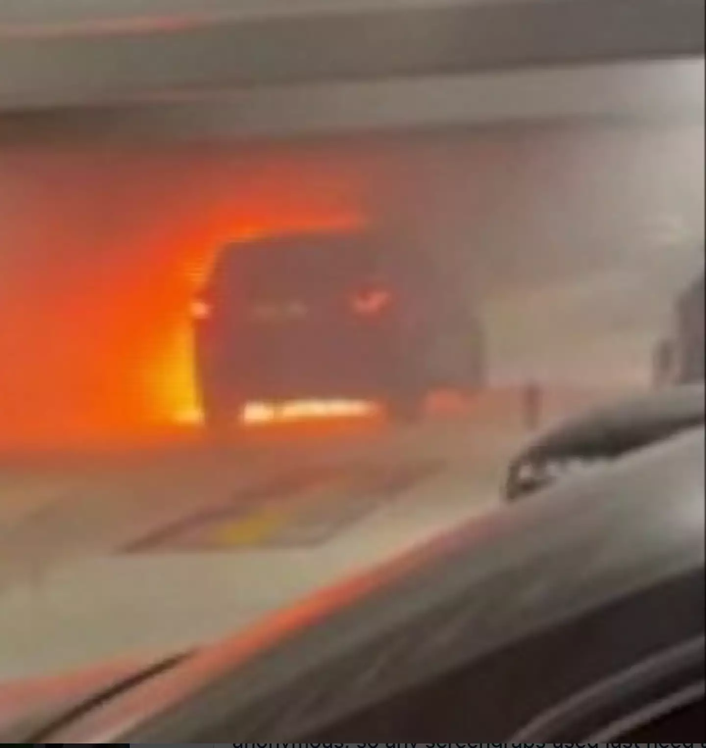 The car could be seen burning in the car park just moments before the explosion.