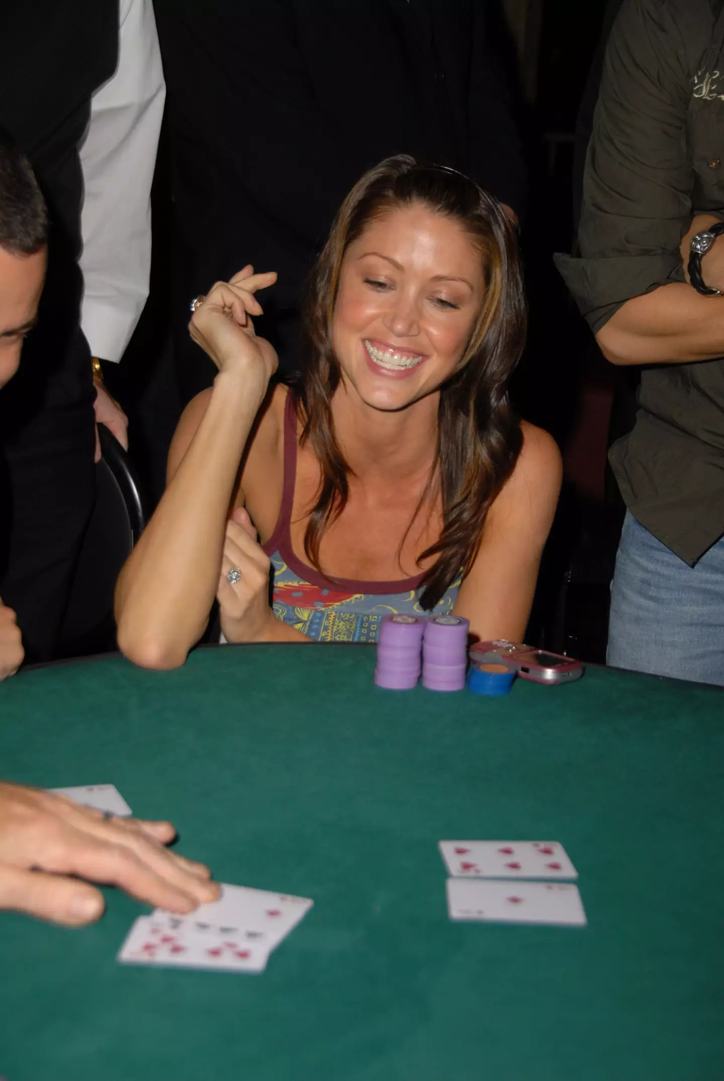 Shannon Elizabeth is a successful poker player.