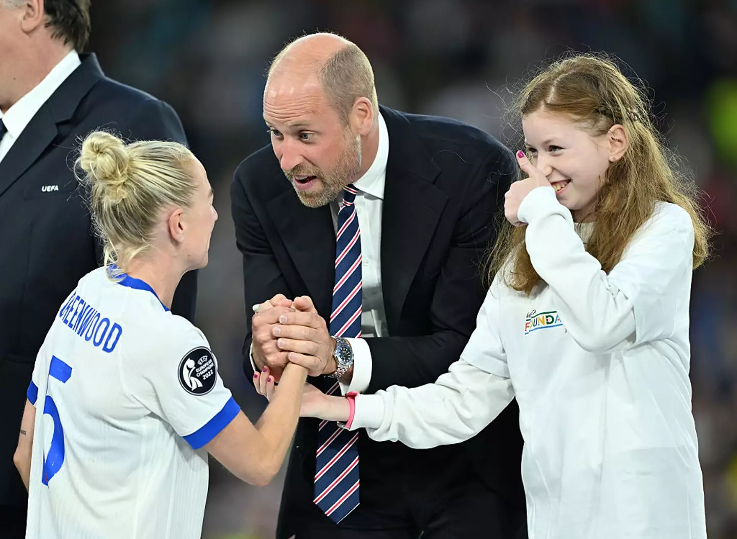 The young girl was stood beside Prince William to hand out some medals and handshakes (Mustafa Yalcin/Anadolu via Getty Images)