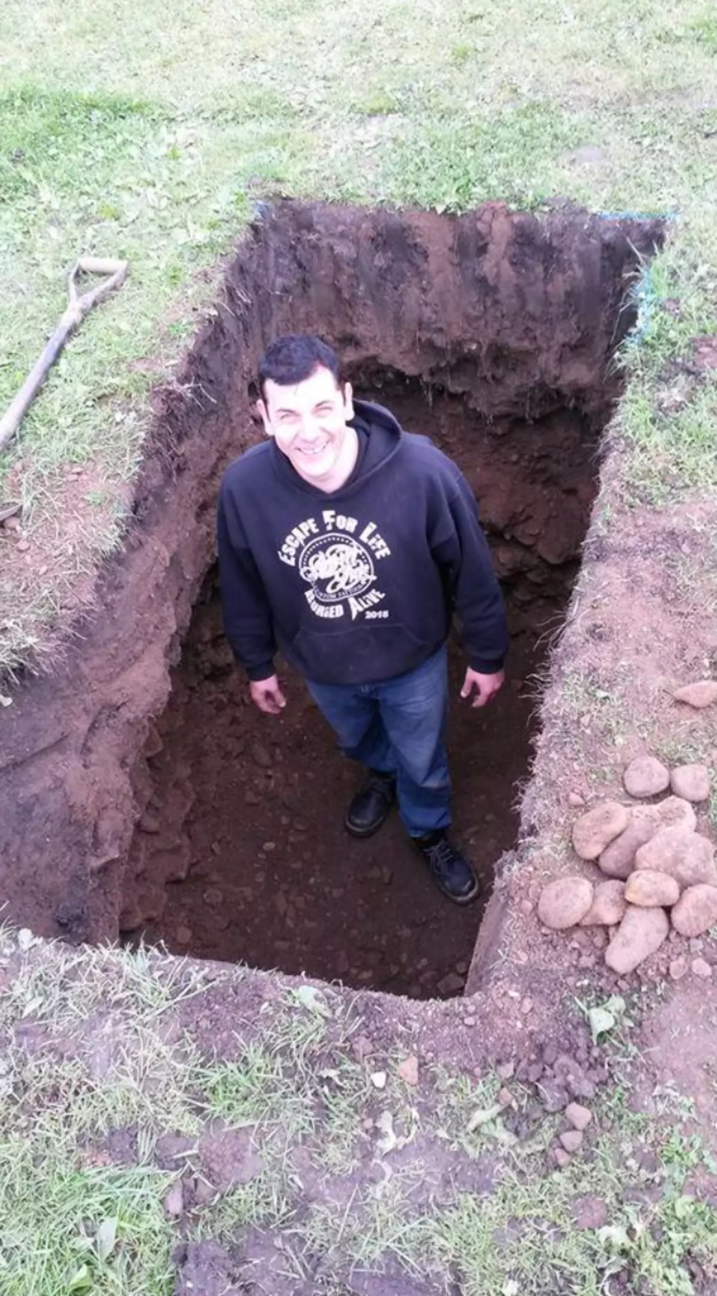 Antony Britton attempted to escape from six feet of soil while handcuffed.