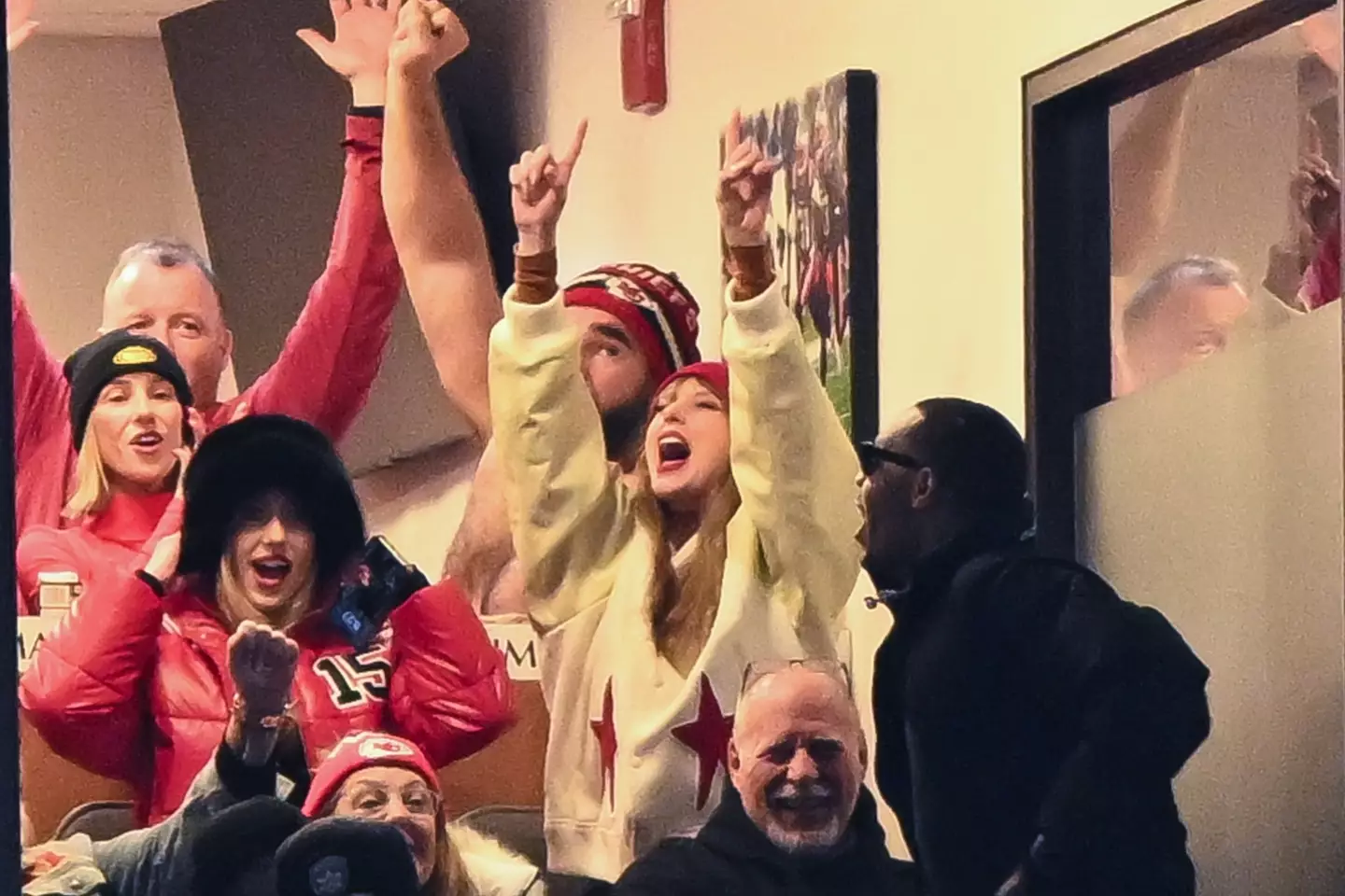 Brittany Mahomes, Jason Kelce, and Taylor Swift react during the second half of the AFC Divisional Playoff game between the Kansas City Chiefs and the Buffalo Bills.