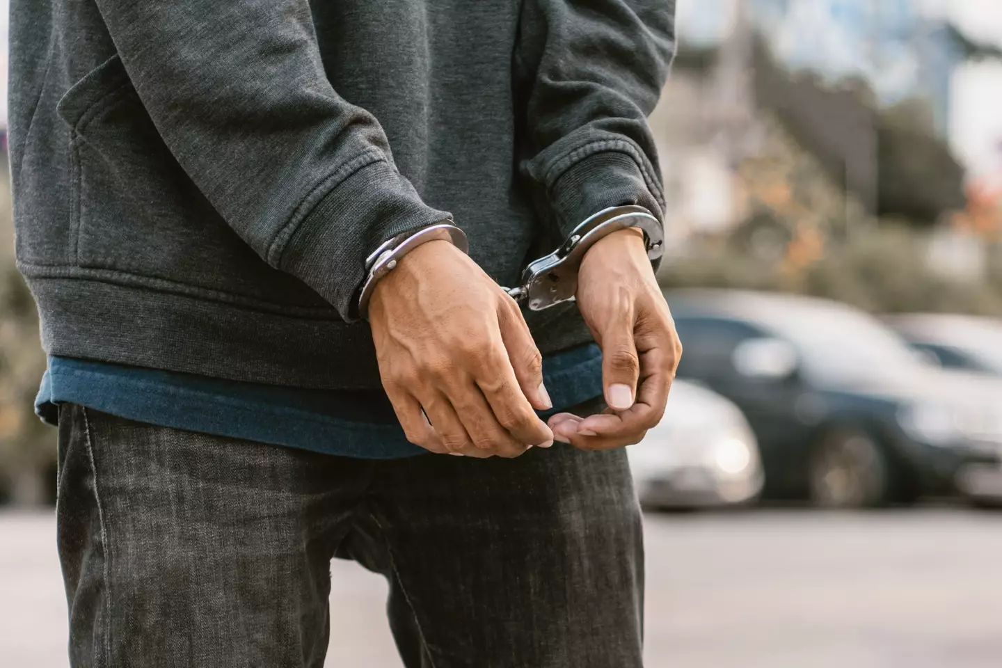 Man in handcuffs.