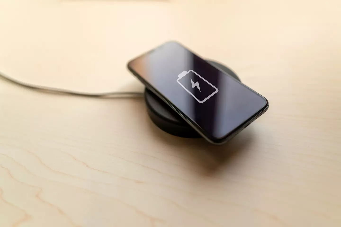 MagSafe is an alternative way to charge your iPhone if it's an iPhone 12 or newer. (Getty Stock Images)