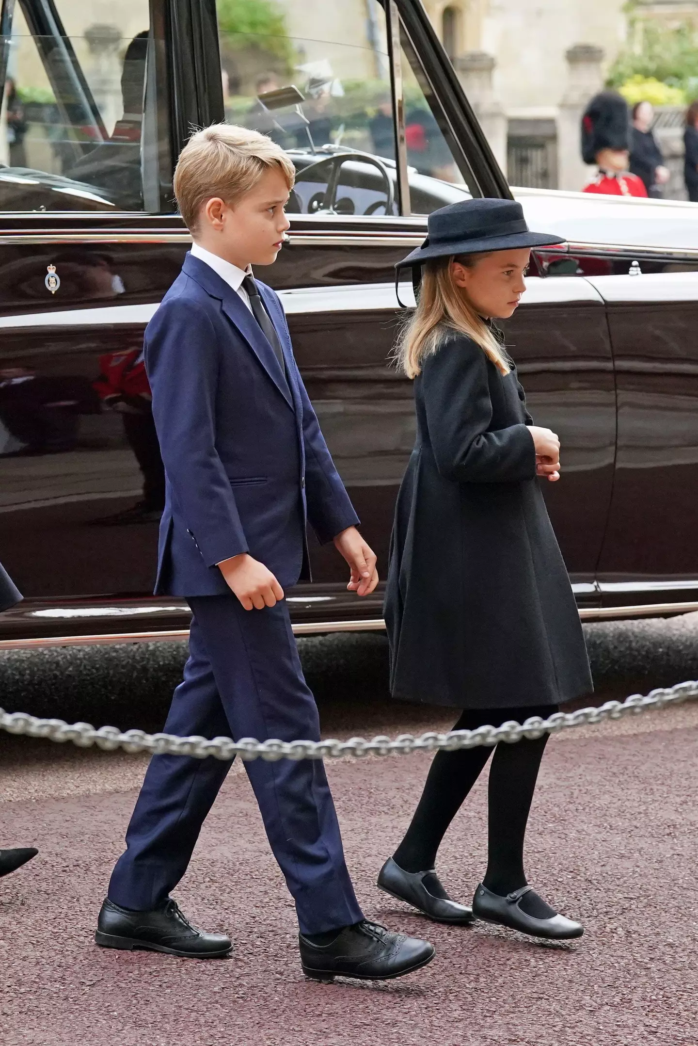 Prince George and Princess Charlotte arrive at committal service for Queen Elizabeth II.