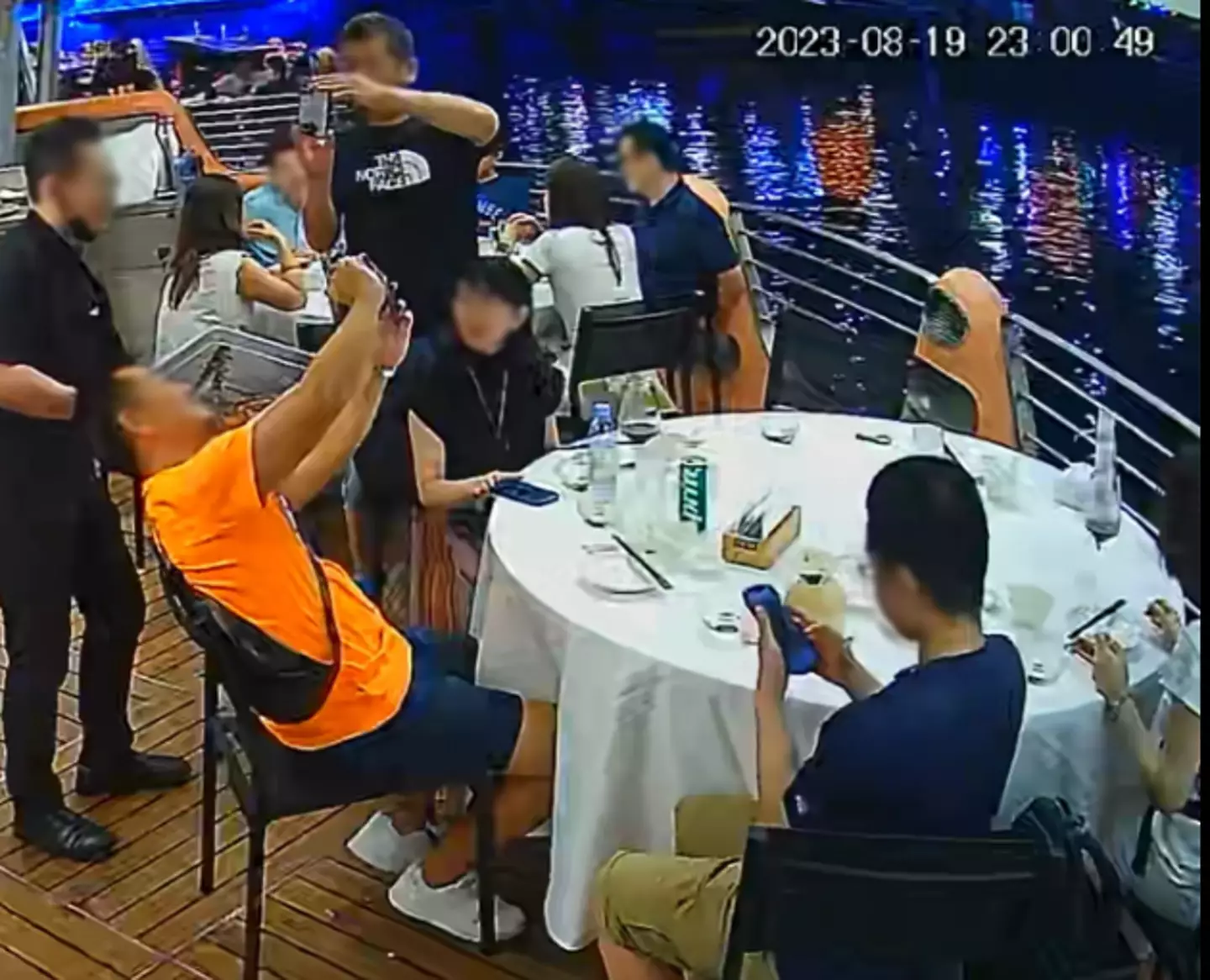 The CCTV shows the group taking selfies with the crab too.