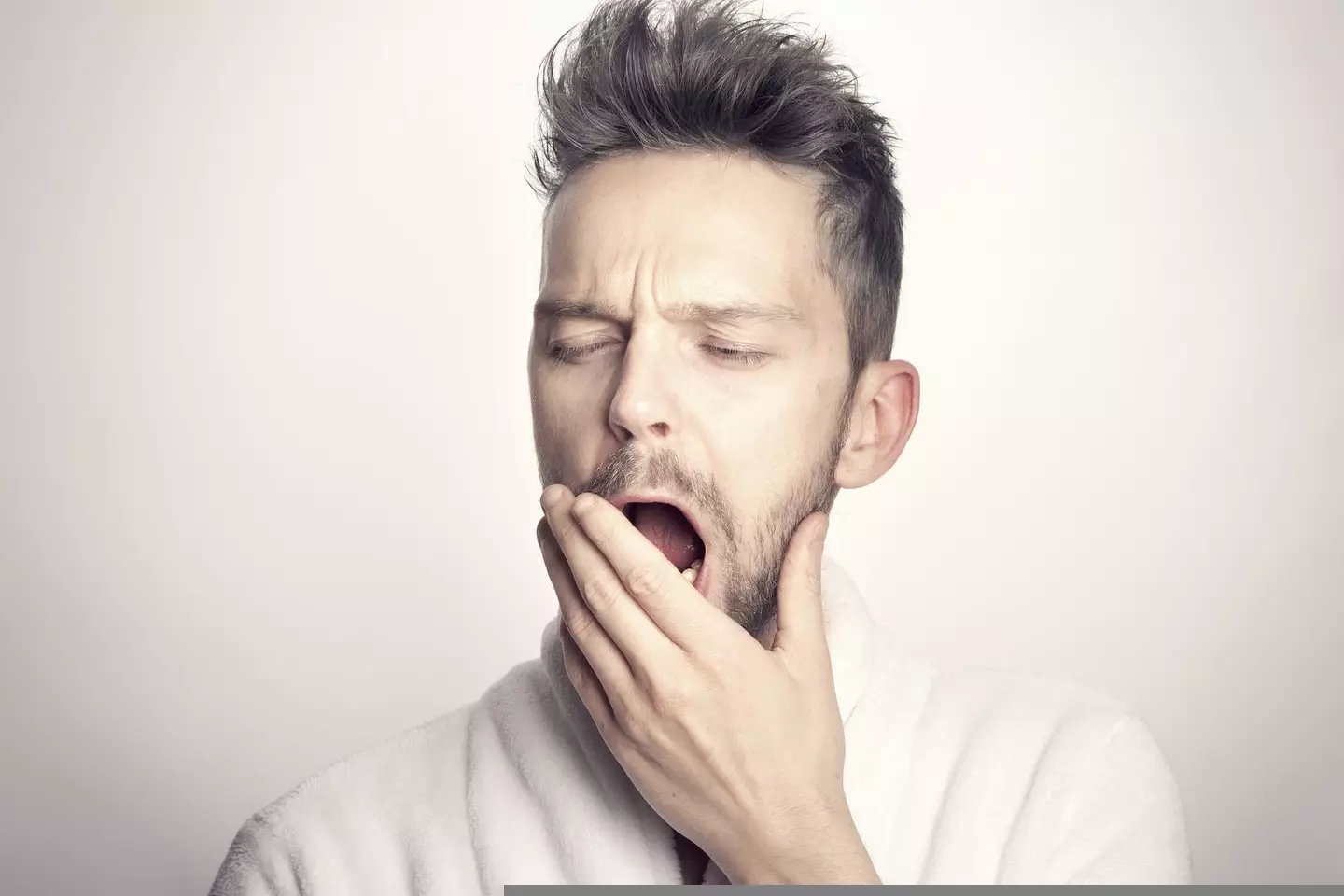 A man yawning.