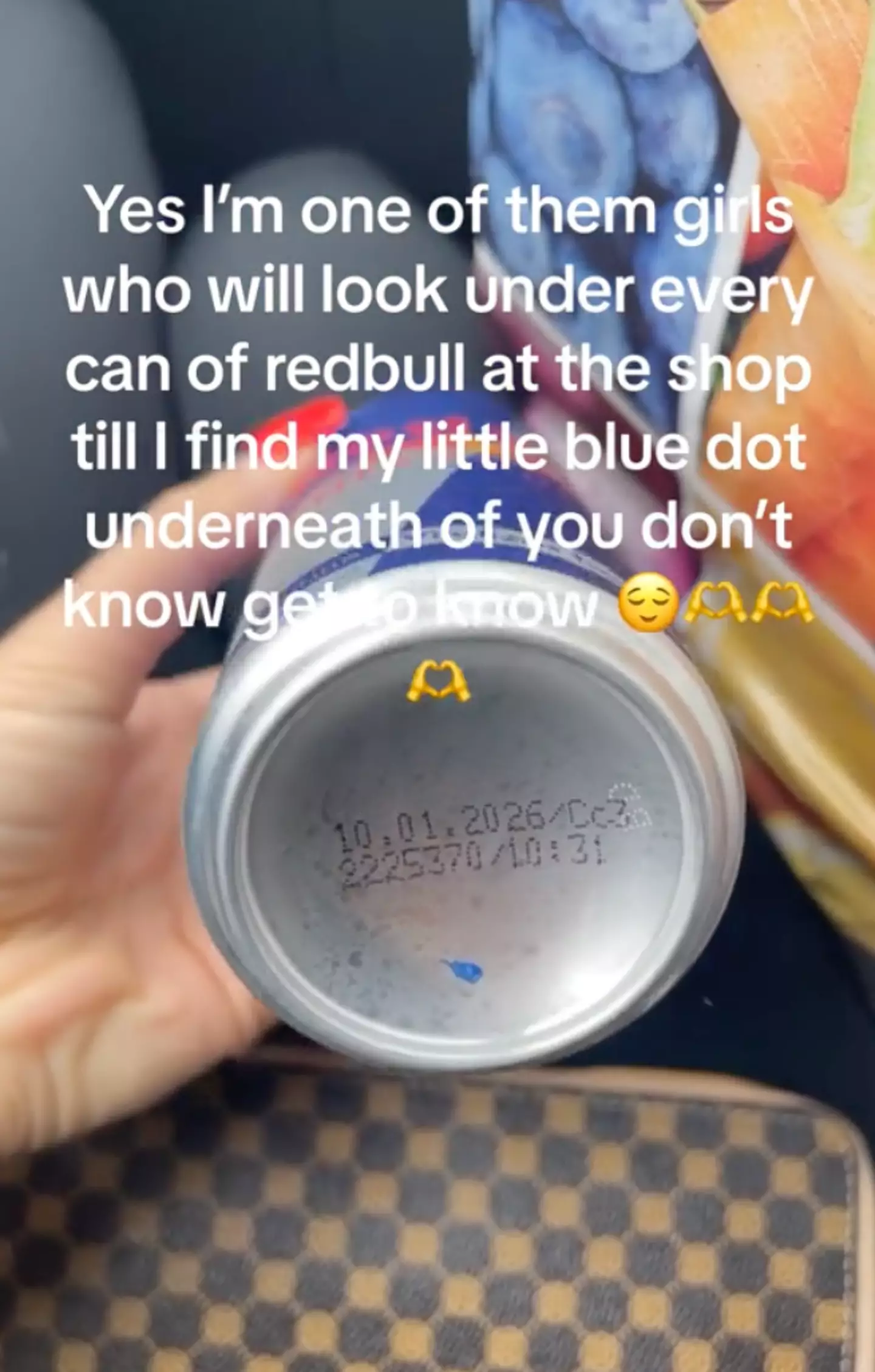 Some Red Bull cans have blue dots on them.