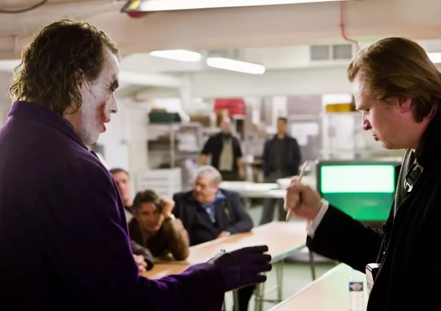 Heath Ledger and Christopher Nolan discuss The Joker's 'magic trick' on the set of The Dark Knight.