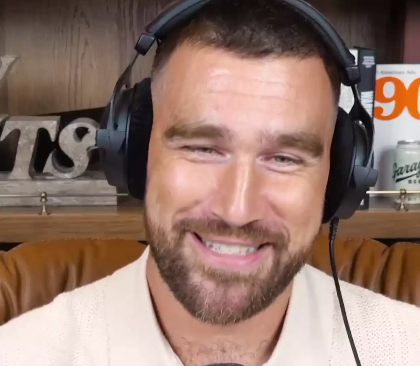 Kelce struggled to keep it together as his brother teased him about lyrics on the song (New Heights Podcast)