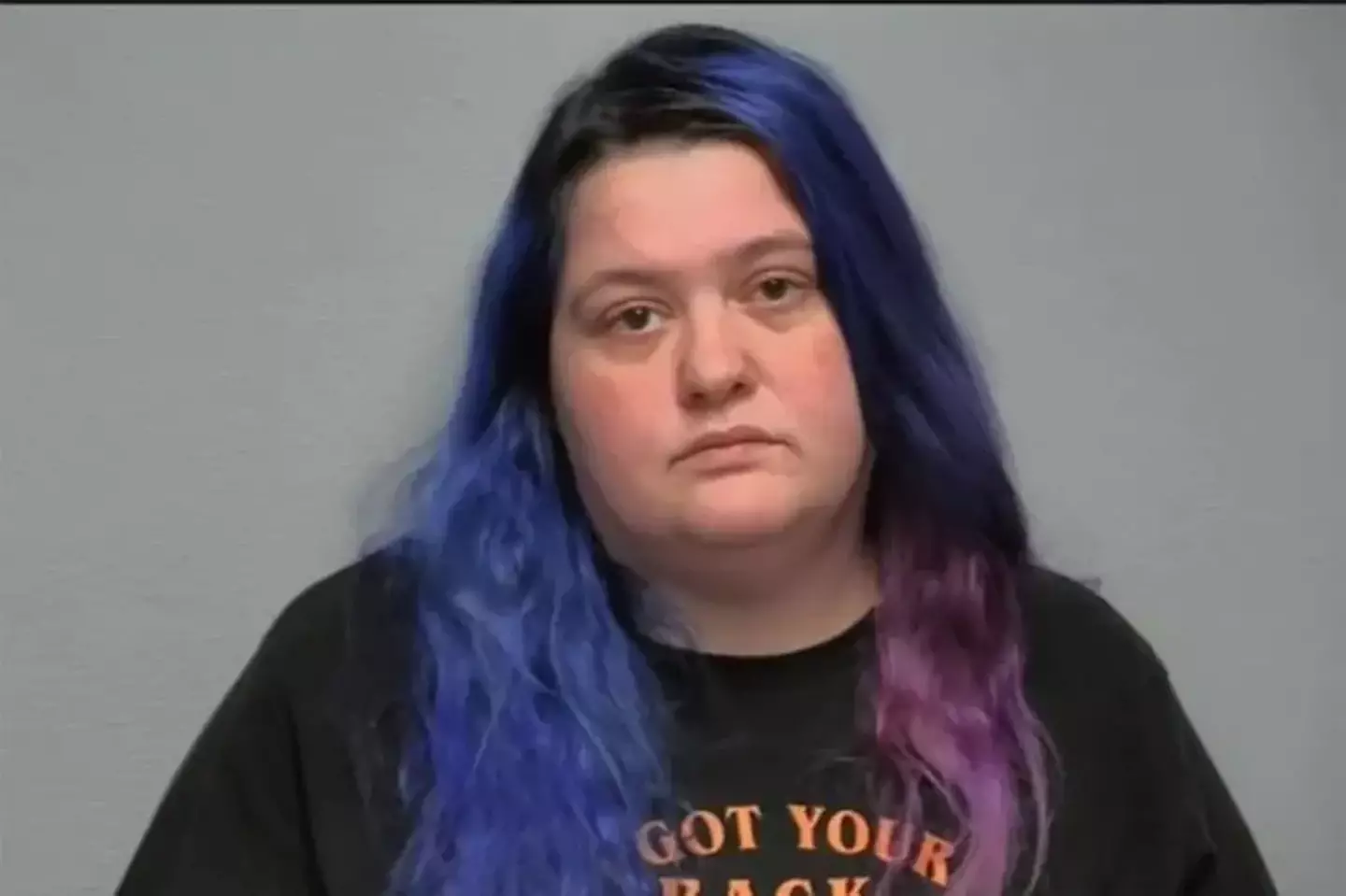 The DoorDash driver has been arrested on felony Battery and Consumer Product Tampering charges (Police handout)