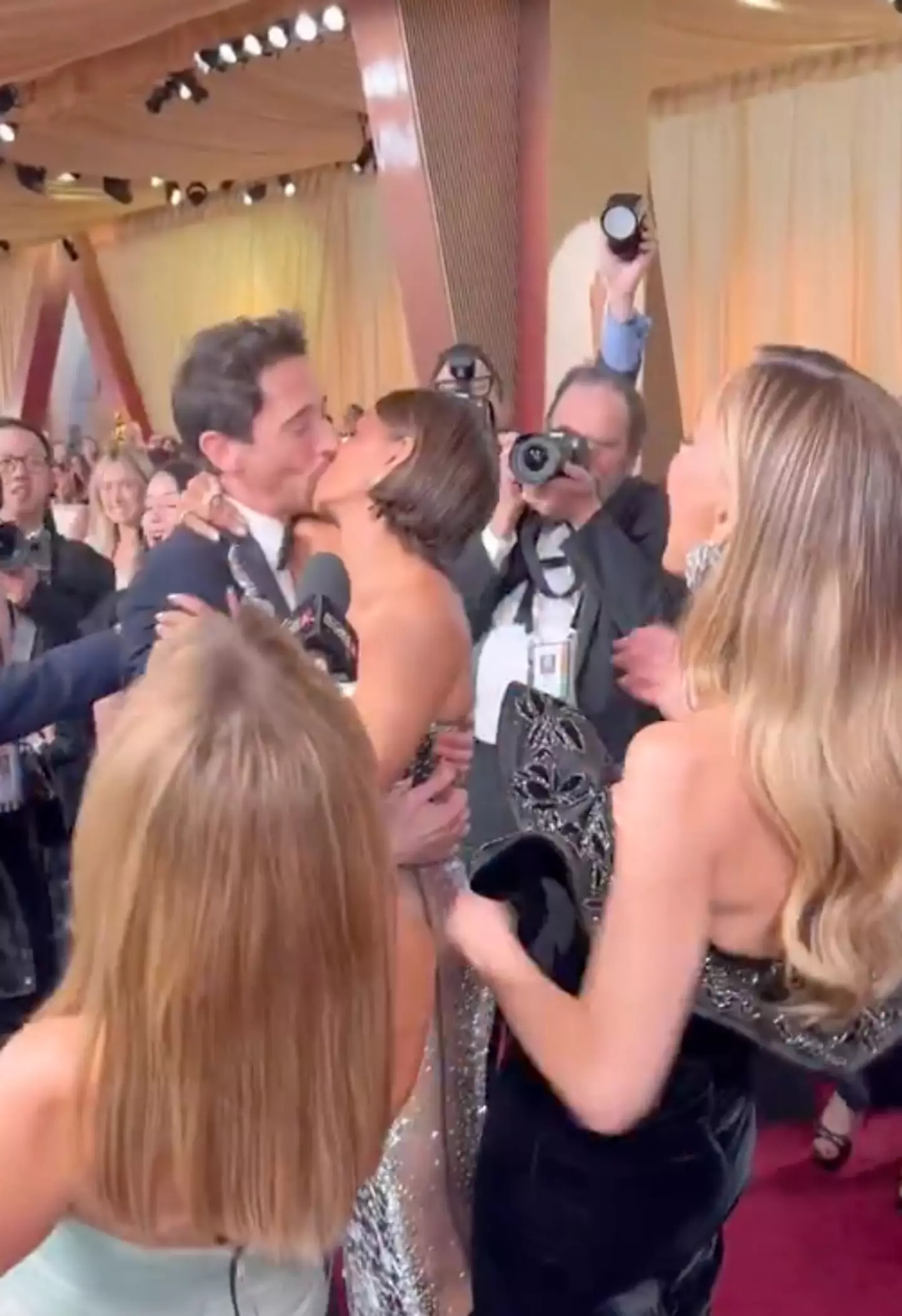 Chapman watched the kiss unfold right in front of her (Instagram/@TheAcademy)