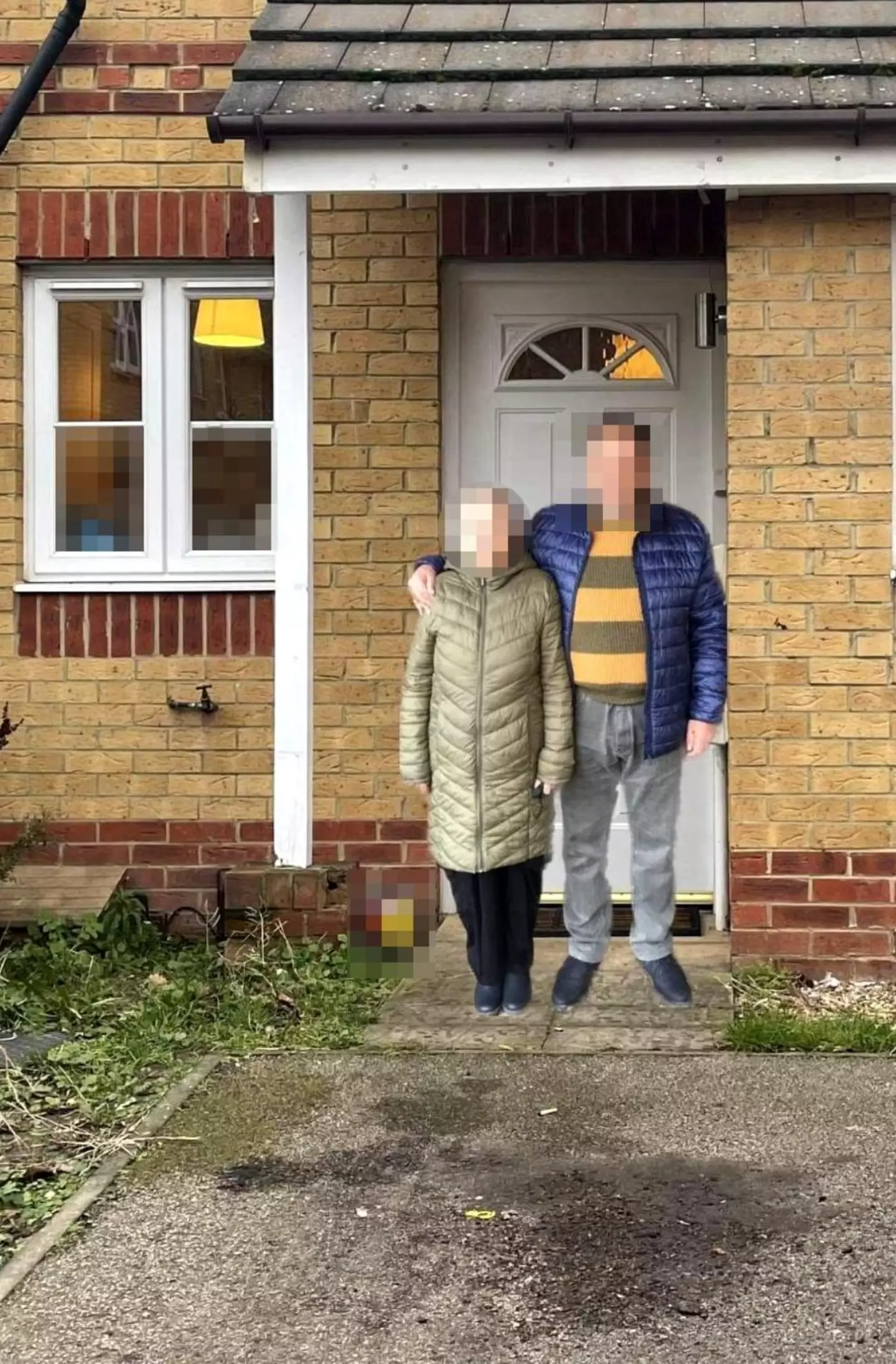 The couple are levitating on their doorstep.