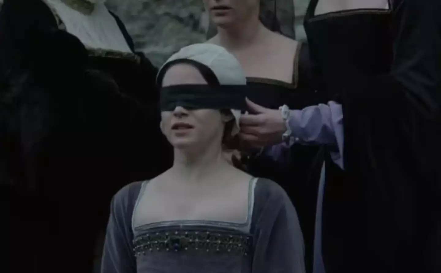 Boleyn can be seen looking fearful throughout the scene, up until her beheading (BBC)
