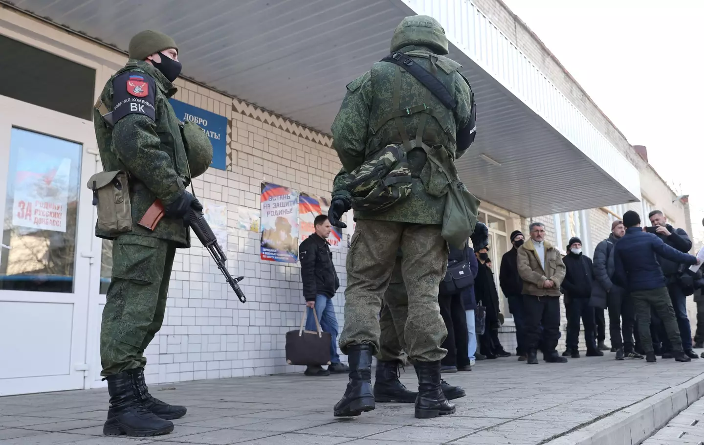 Servicemen outside a mobilisation centre in Donetsk.