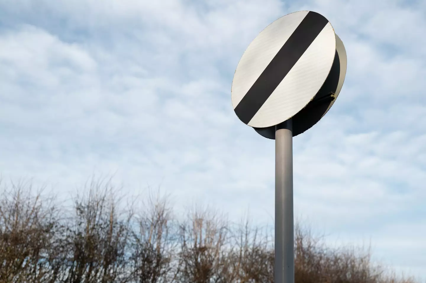 This sign means the national speed limit applies.