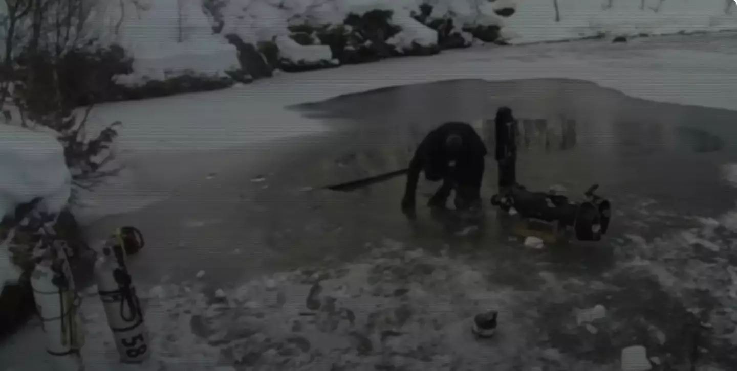 The five Finnish men, seen breaking the icy entrance to the cave, planned for it to be a five-hour dive.