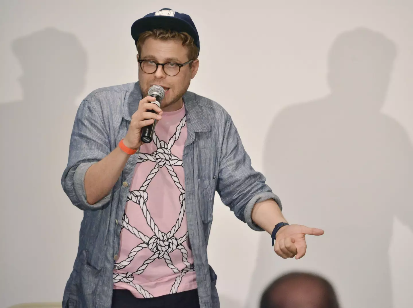 Adam Conover on stage at The Comedy Comedy Festival.