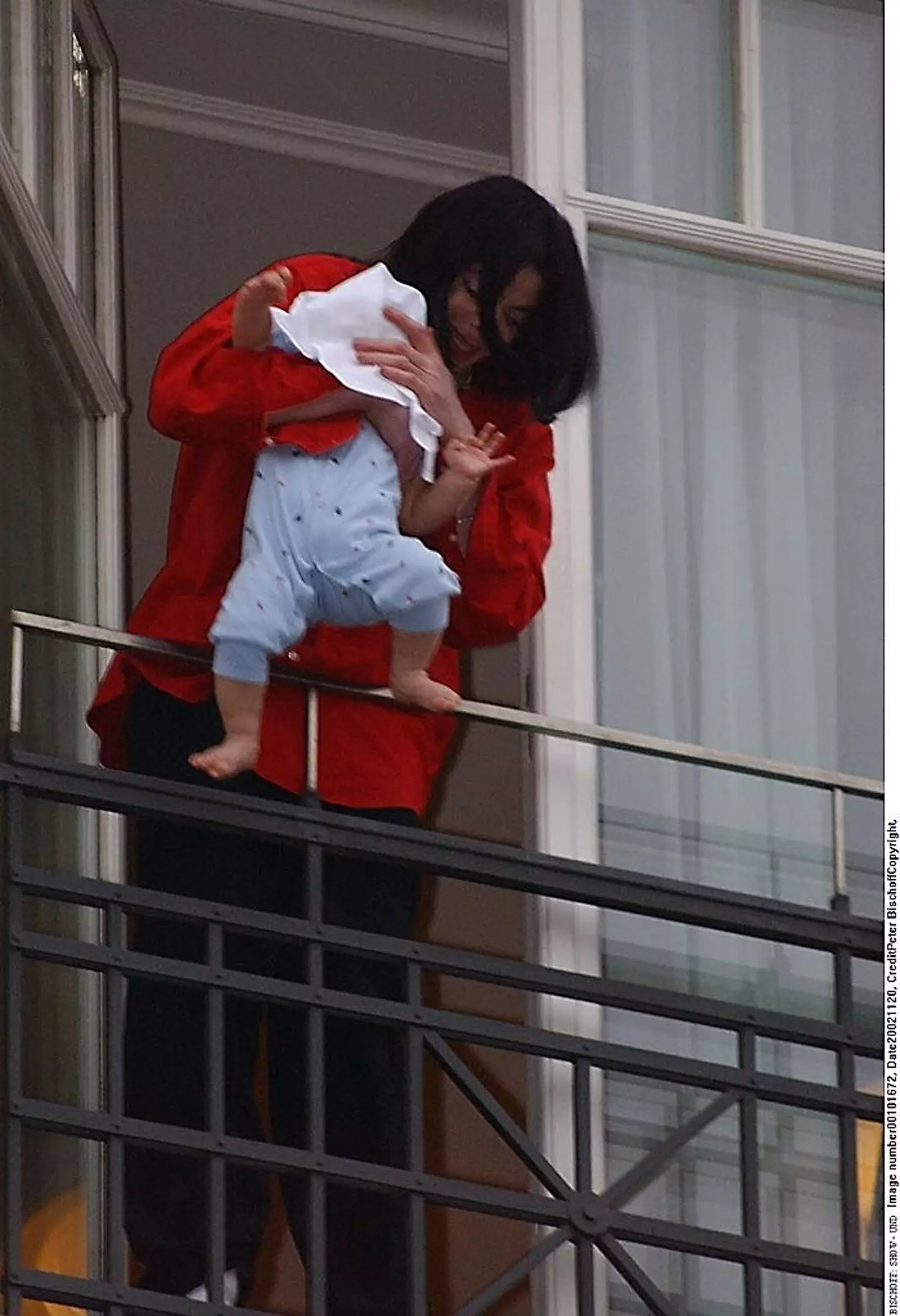 MJ would later apologise for dangling his baby out of a balcony window (Peter Bischoff/Getty Images)