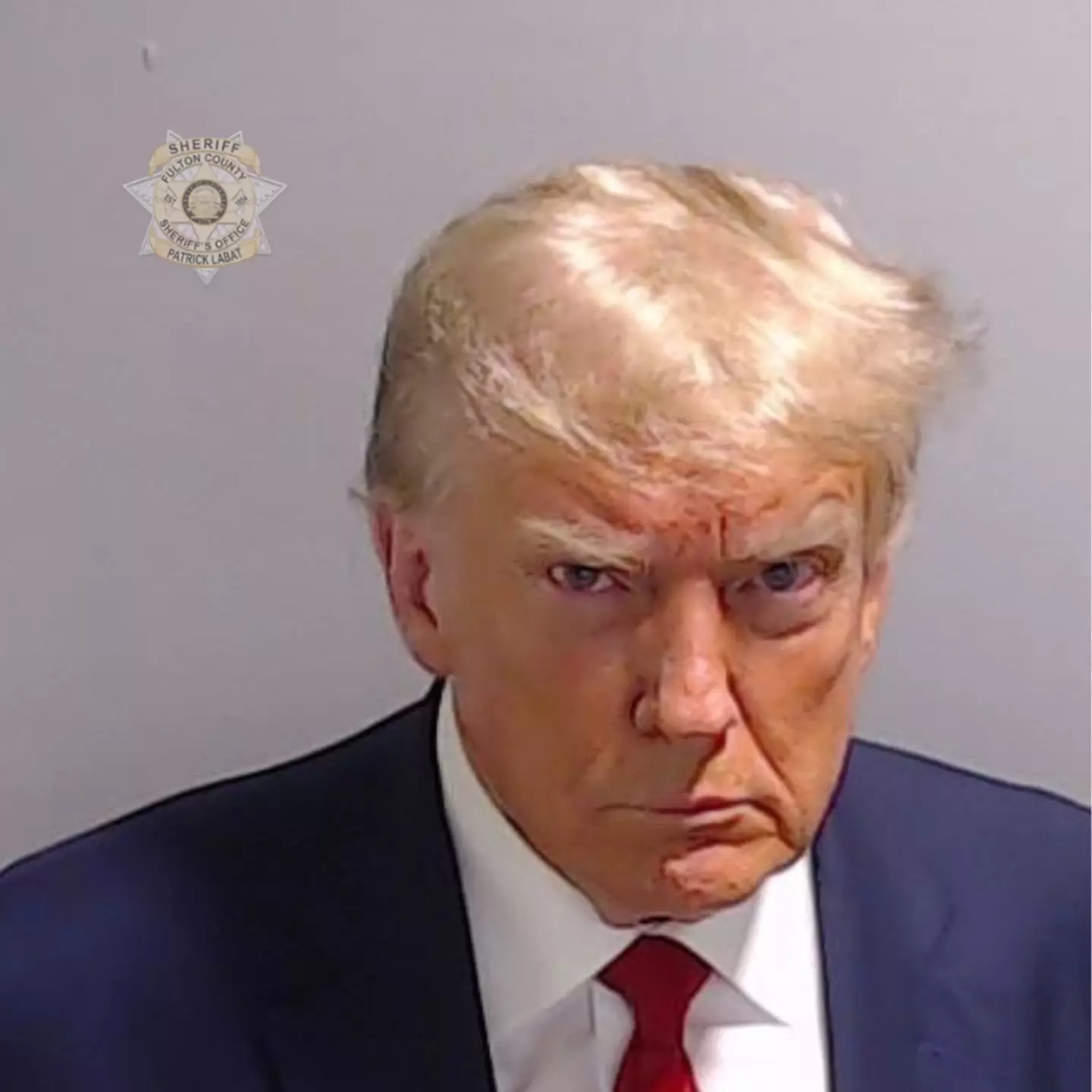 Seems he's a fan of the photo. (Fulton County Sheriff's Office via Getty Images)