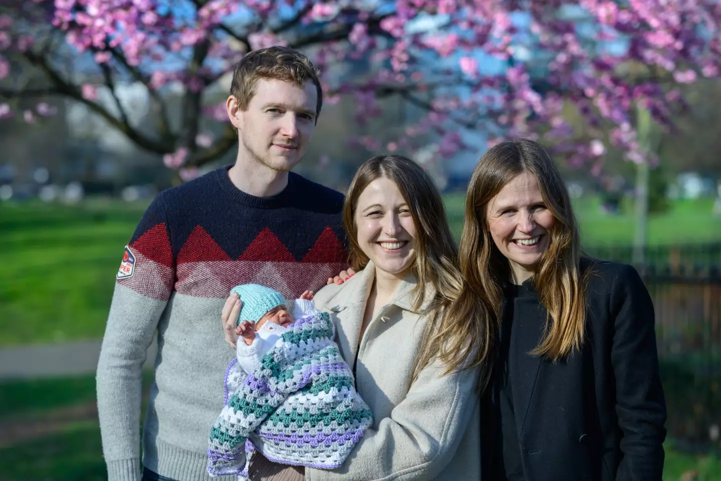Grace Davidson and her husband Angus with their daughter and Grace's older sister Amy (PA)