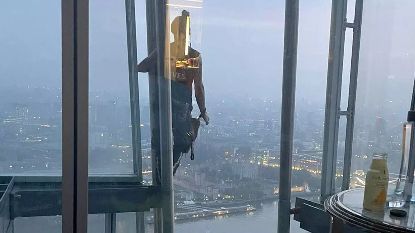 The couple had the surprise of their lives seeing the climber outside their 40th floor window.