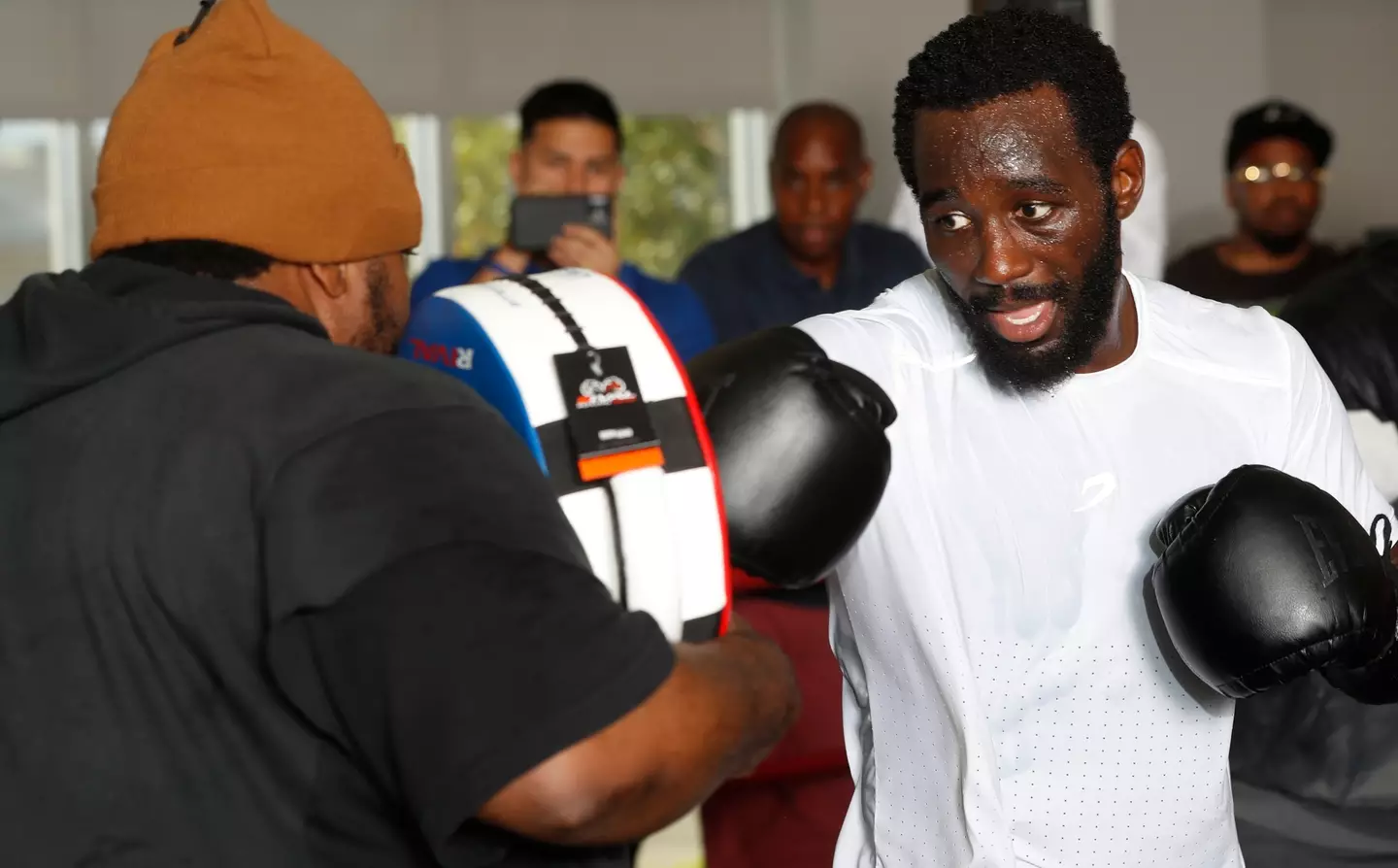 McIntyre trains unbeaten world champion Terence Crawford (right) who attended Manchester Crown Court today.