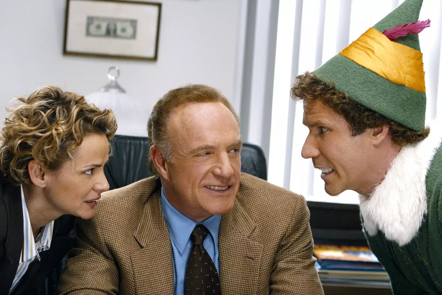 James Caan (centre) with Will Ferrell and Amy Sedaris in Elf (Warner Bros)