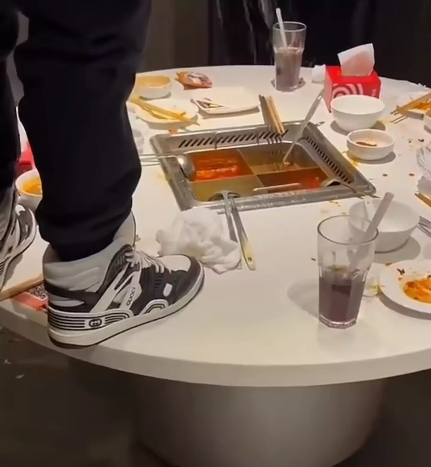 The vile footage of the teenagers urinating into a broth has sparked outrage (X)