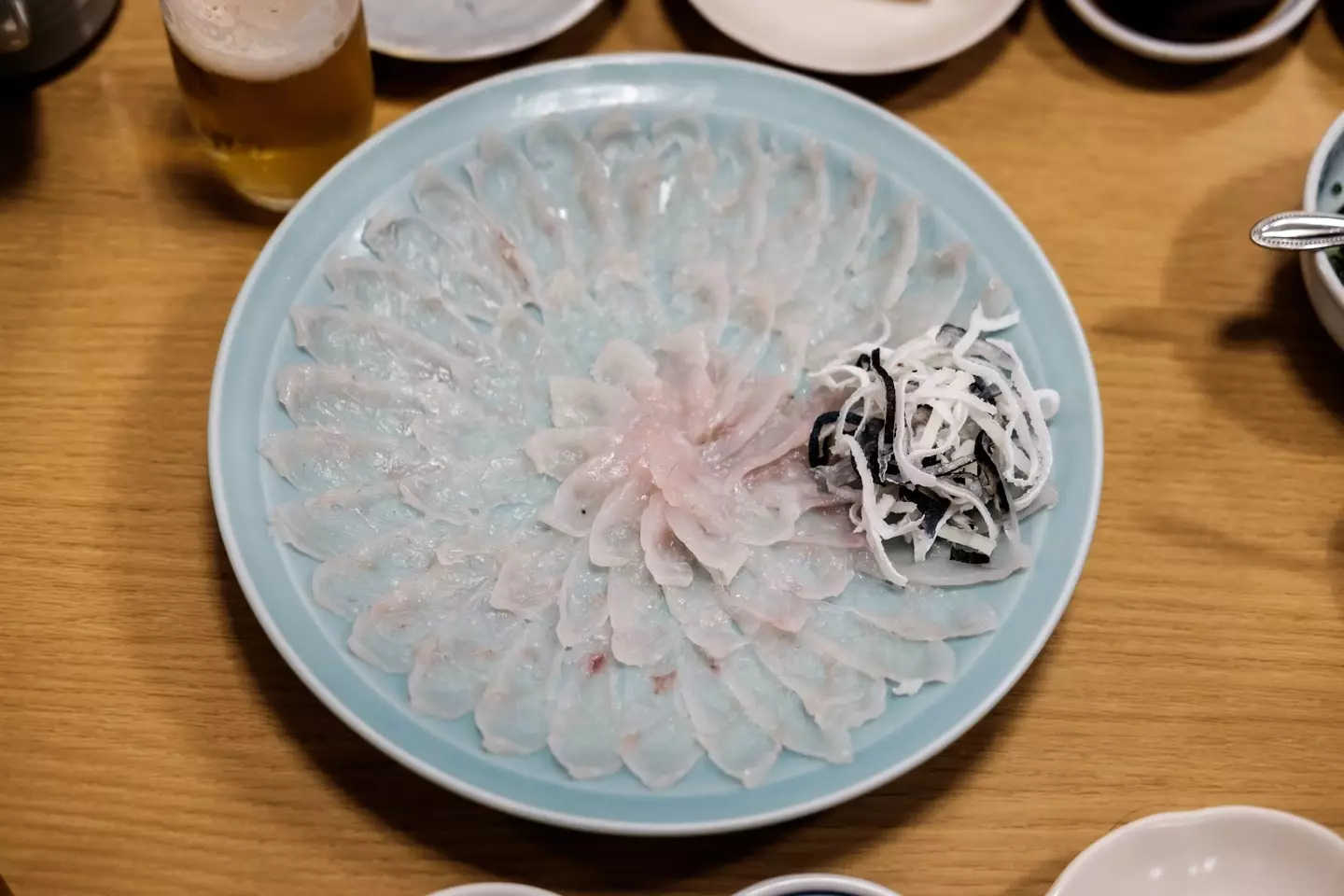 The deadly dish is often arranged in a flower formation to take your mind off the potential for fatal poisoning.