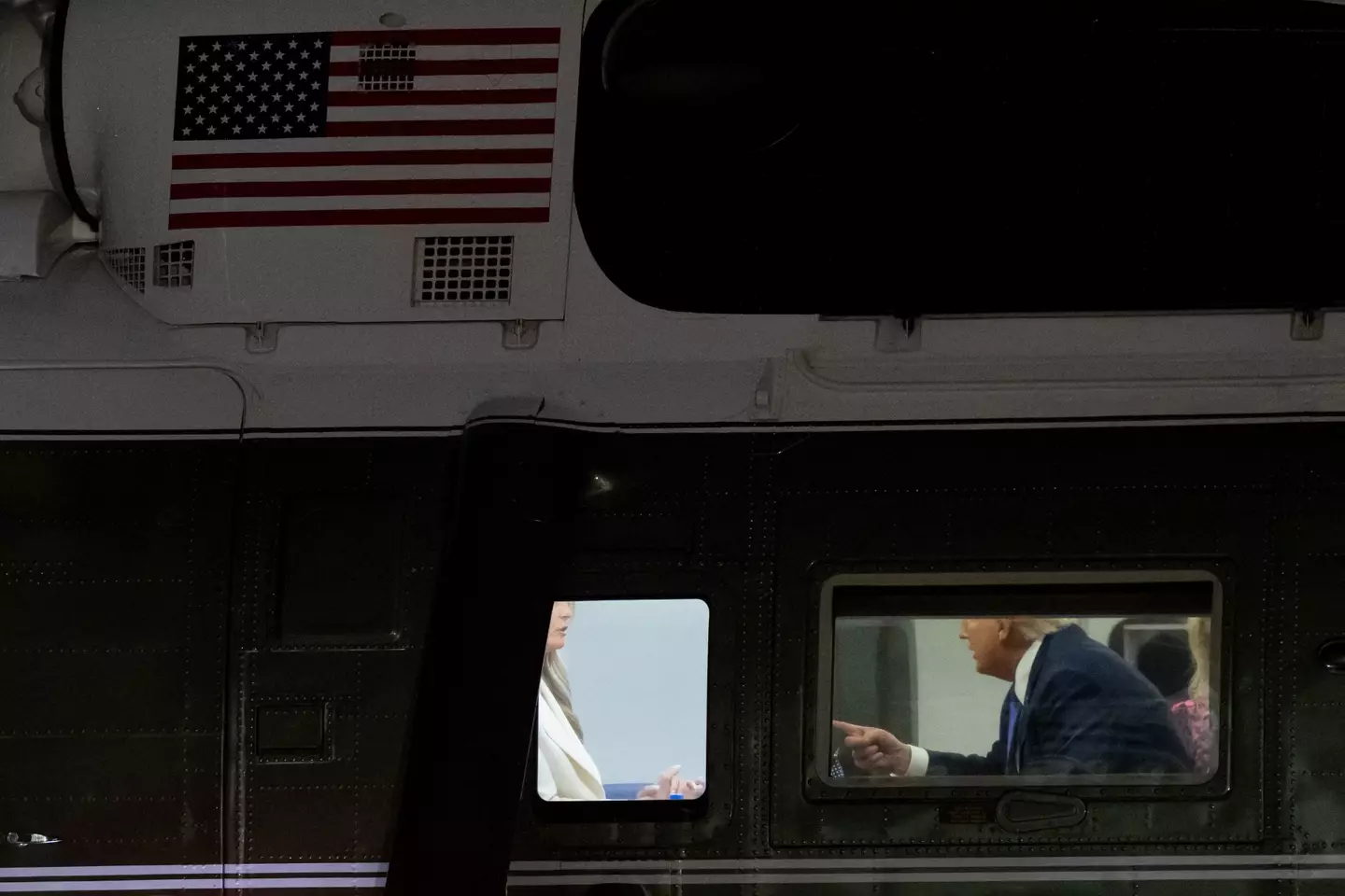 The body language expert said that without seeing their faces, their hand gestures would 'suggest an argument', but insists that wasn't the case (Saul Loeb/Getty)