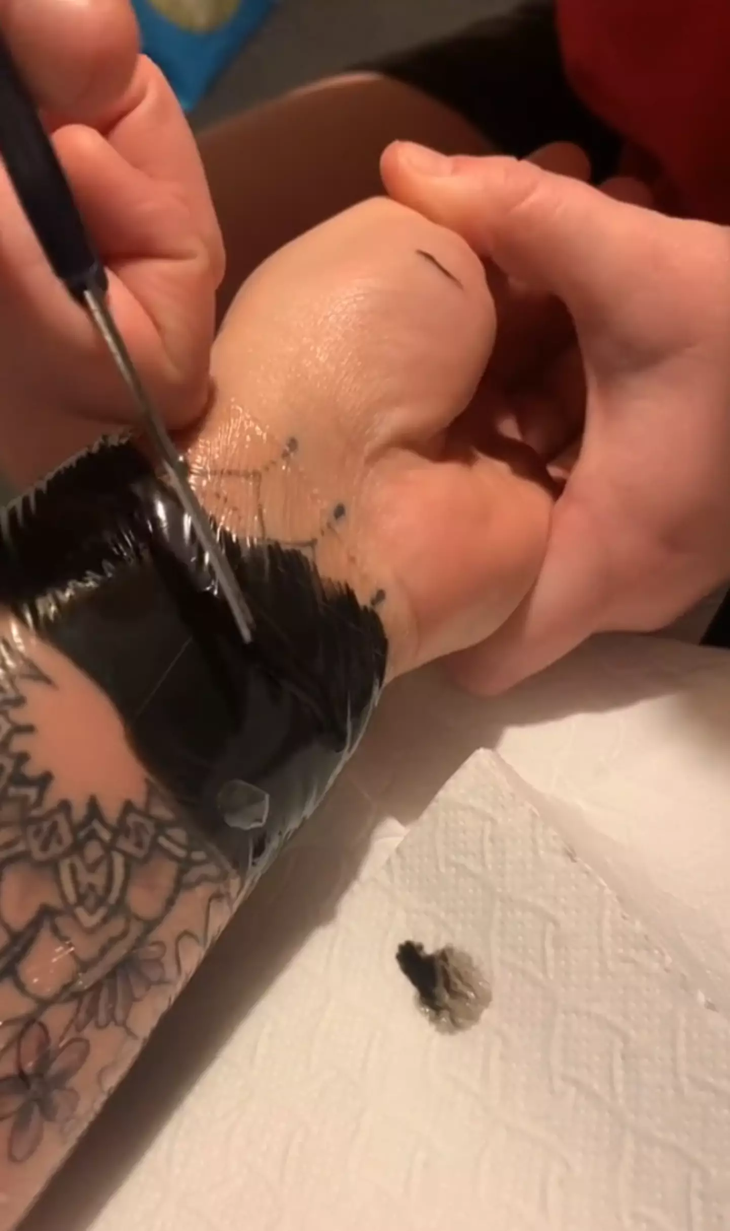 A TikTok user showed off her 'ink sack' after getting a new tattoo.