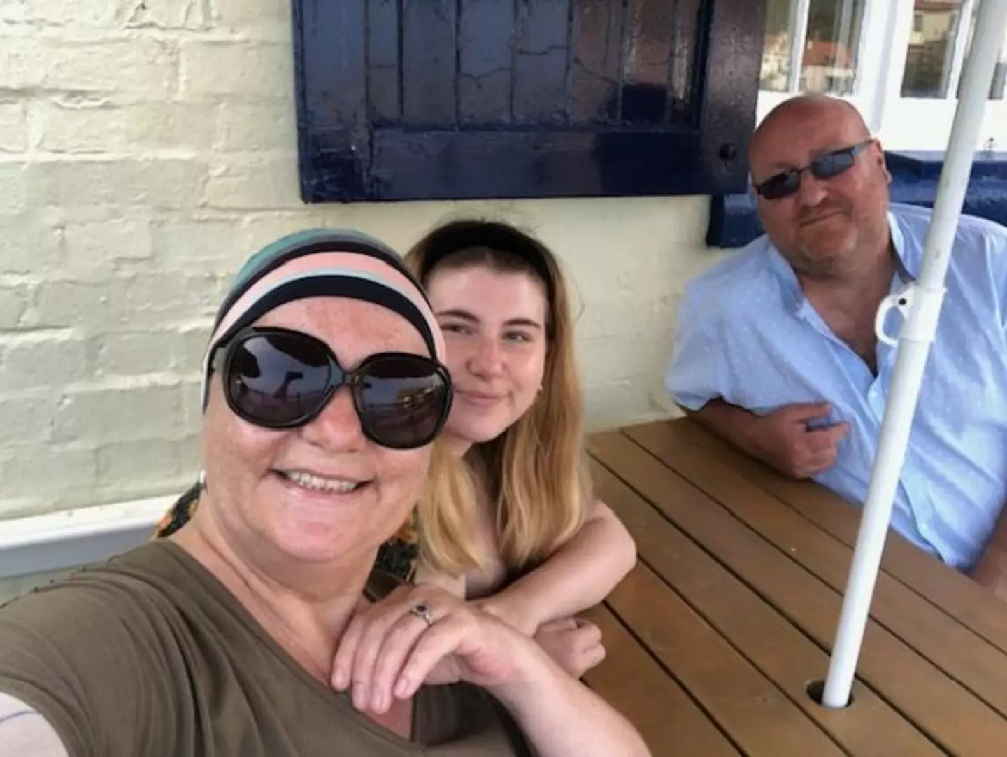 Lizzie with her daughter and fiancé (Lizzie Spear / Leukaemia UK)